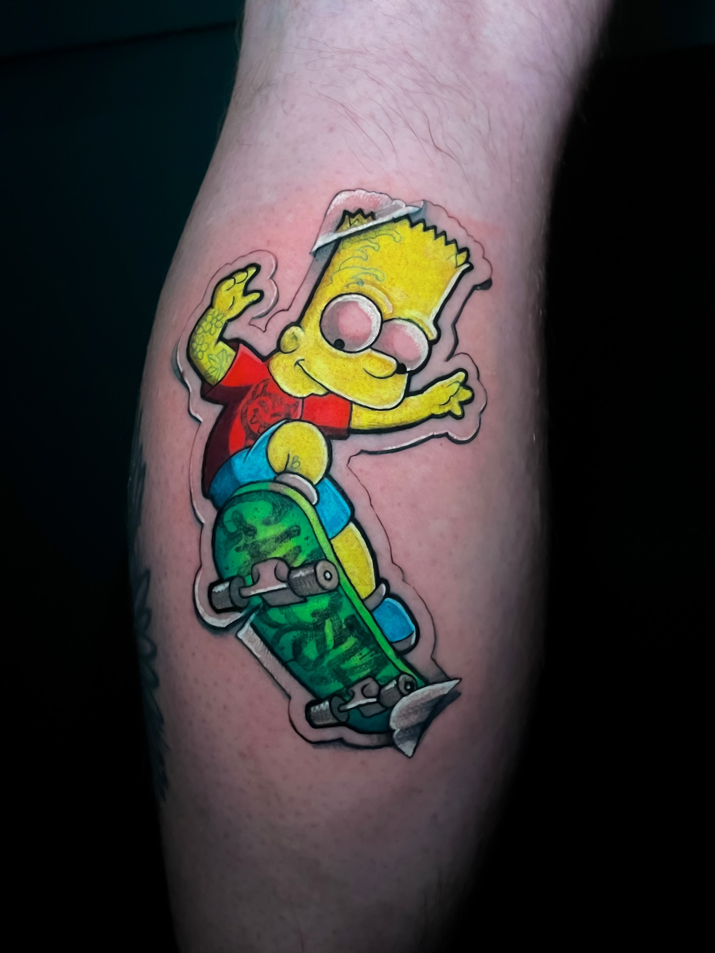 Bart Simpson new school tattoo on the forearm by Tattoo artist in Seattle, WA