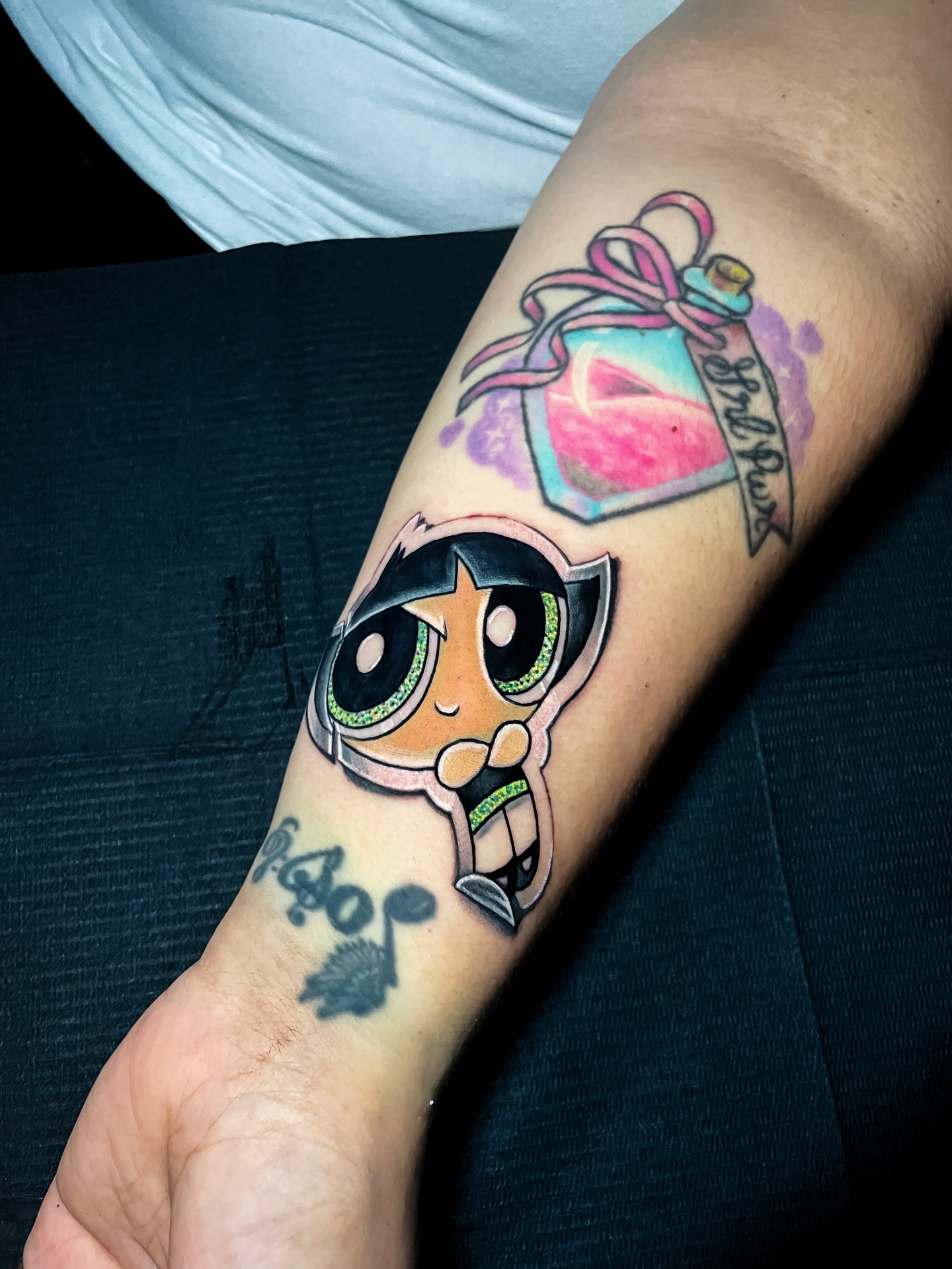 Powerpuff Girl anime tattoo on the forearm by Tattoo artist in Seattle, WA