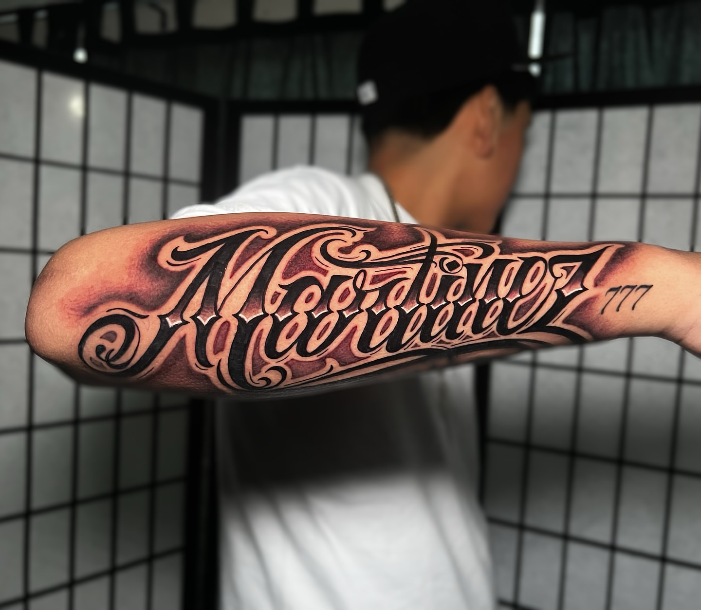 Script lettering lettering script tattoo on the forearm by Tattoo Artist