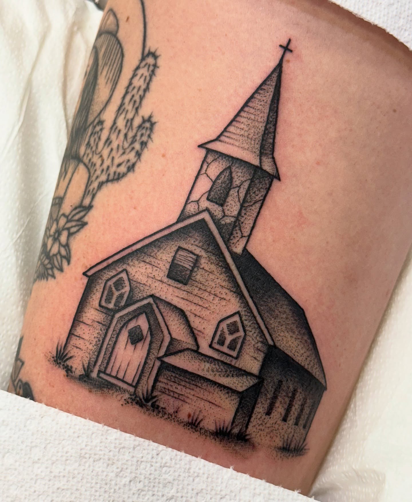 Church black and grey tattoo on the forearm by jenna clark🎨