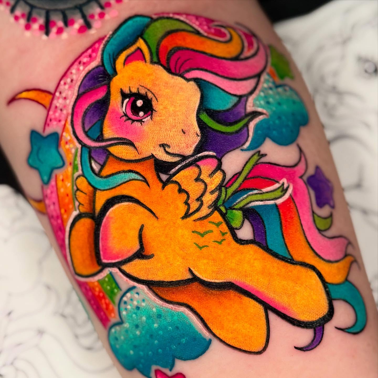 My little pony illustrative tattoo on the thigh by Brianna Dickson