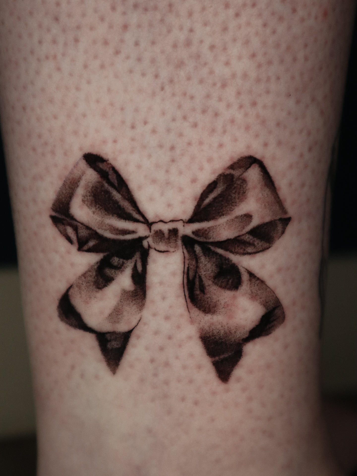 Bow black and grey tattoo on the forearm by 𝕮𝖔𝖓𝖓𝖔𝖗 ☾  ~ TATTOO ARTIST