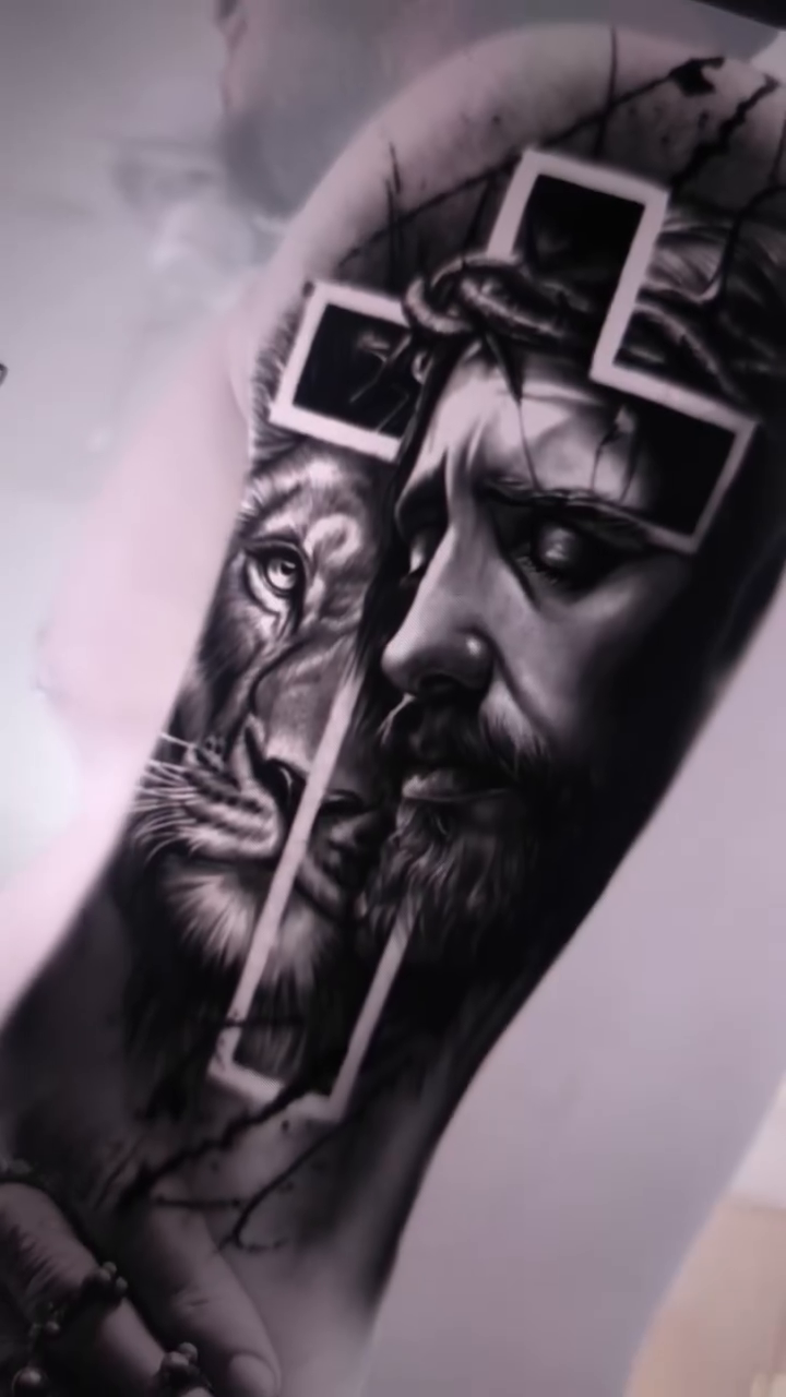 Jesus Christ and a lion realism tattoo by Xavier NYC TATTOO ARTIST