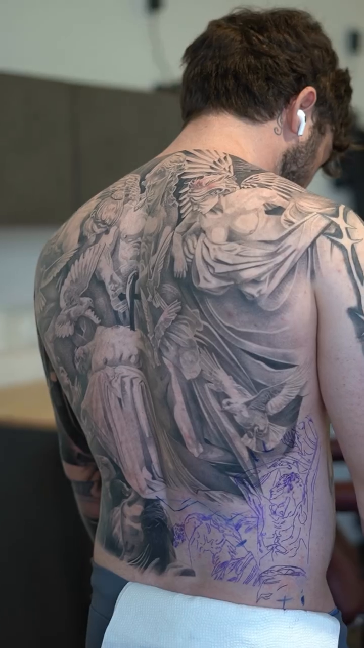 Angelic figures and floral elements realism tattoo by sacramento tattoo CA