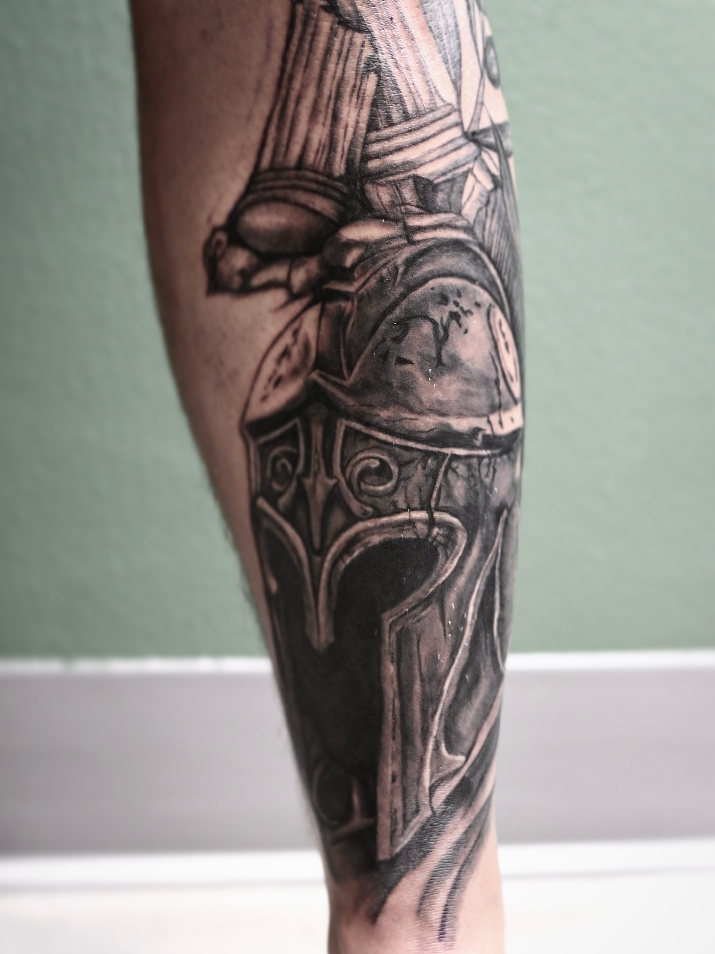 Helmet and armor realism tattoo on the forearm by Love 🥀 222