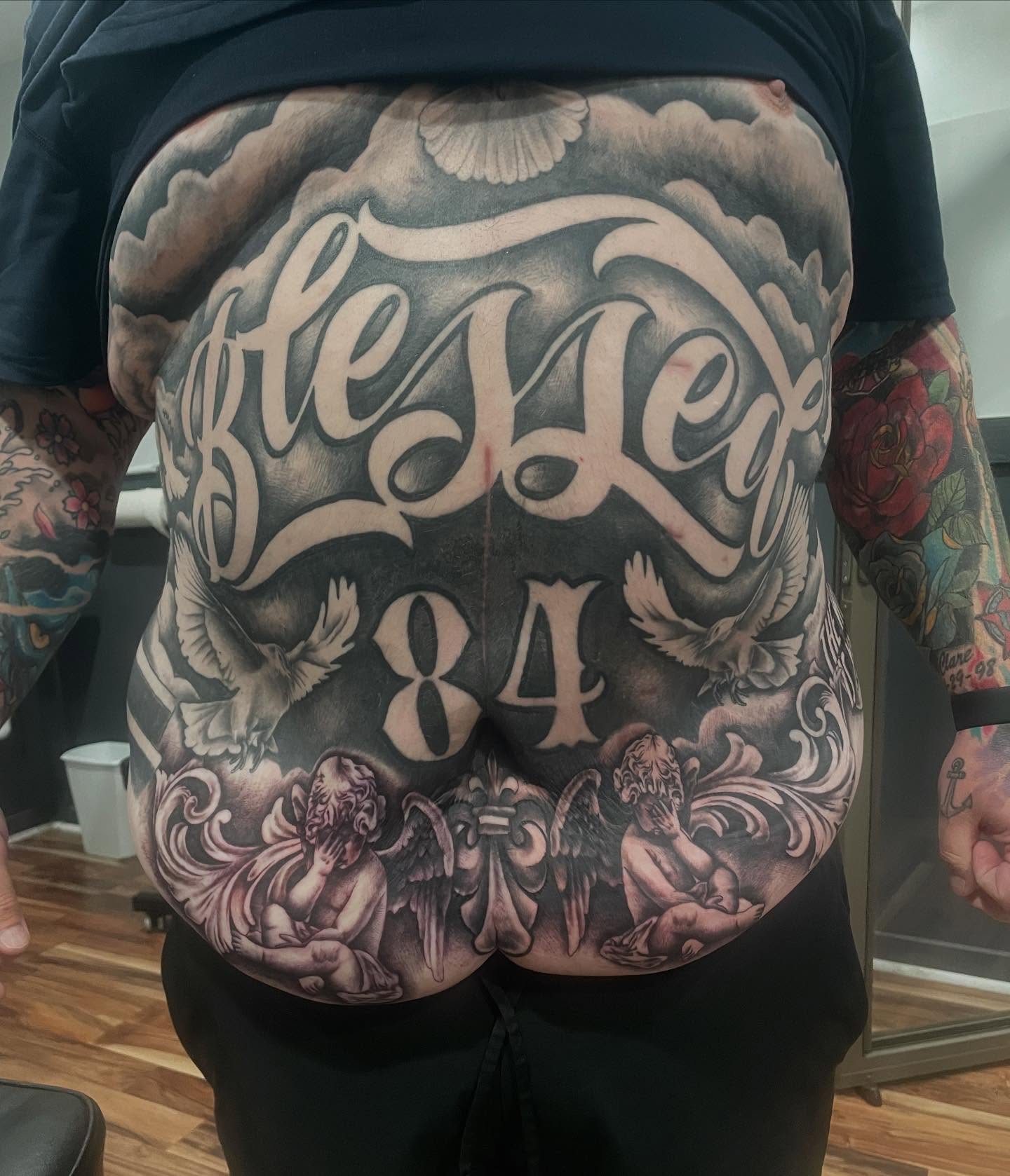 Script lettering lettering script tattoo on the back by Blake