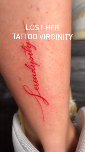 Red script tattoo on leg lettering tattoo on the leg by @blackastaratattoo