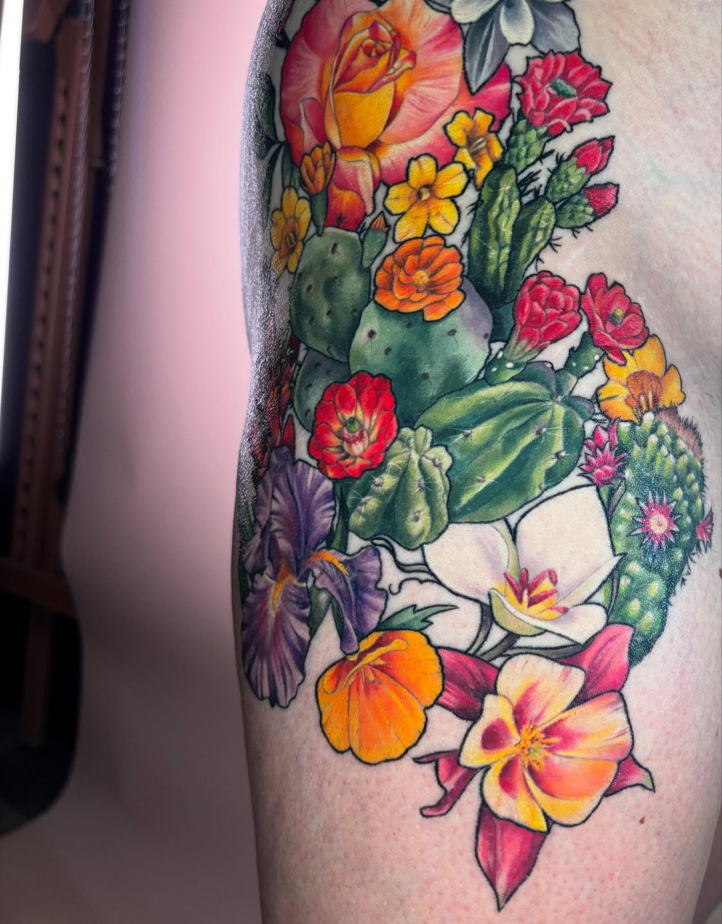 Floral bouquet new school tattoo on the forearm by Chelsey Moore, Albuquerque, New Mexico
