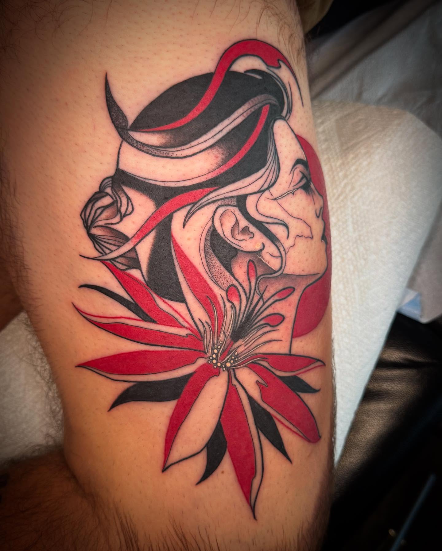 Lily and woman new school tattoo on the thigh by Paul Giovis