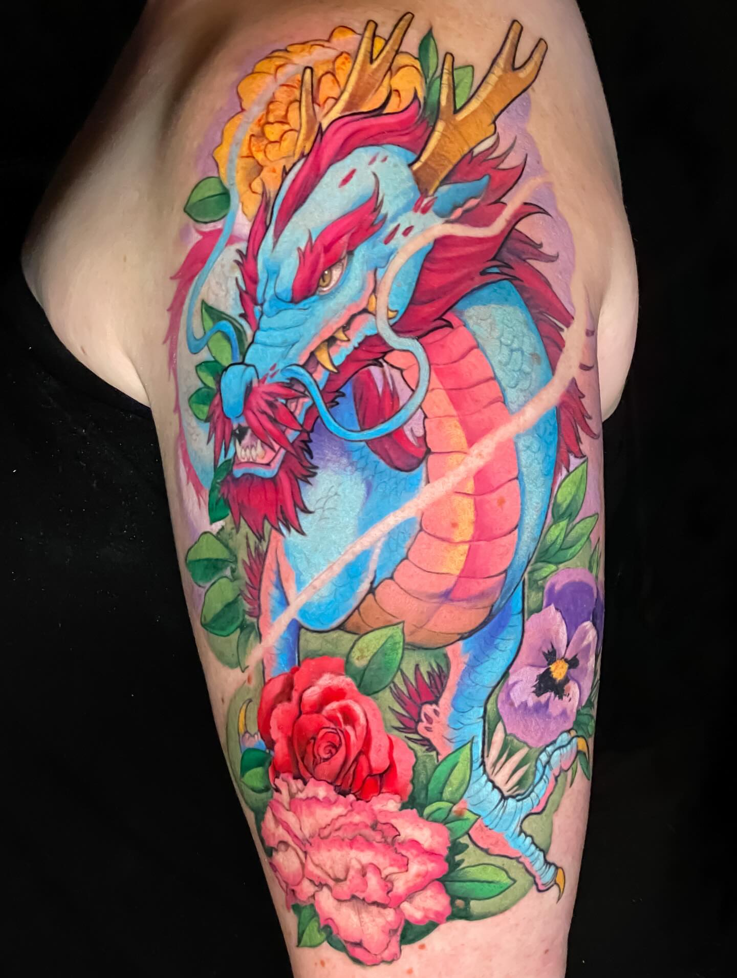 Dragon and flowers new school tattoo on the forearm by Picasso Dular, Lake Forest, California