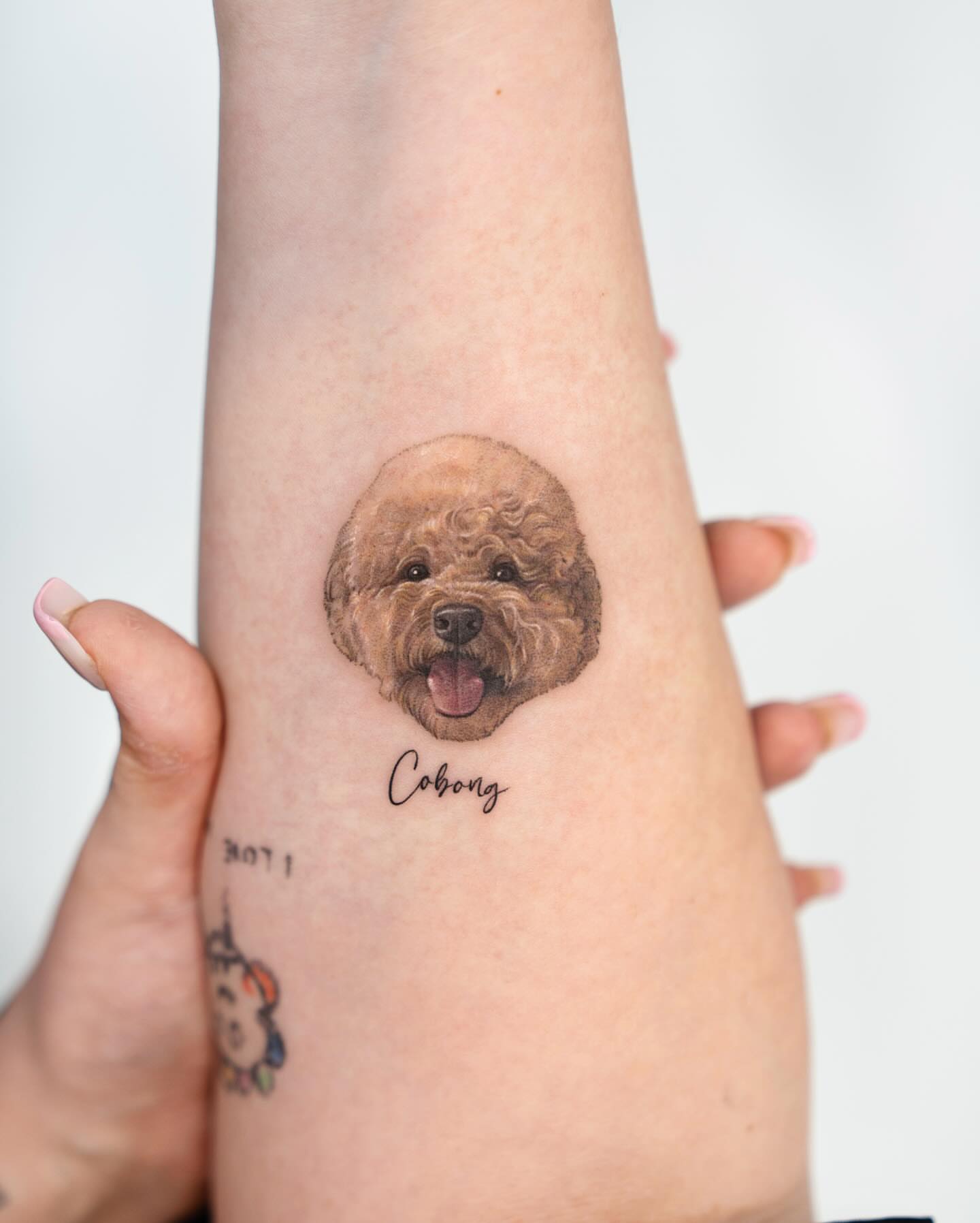 Dog portrait realism tattoo on the forearm by Zeeyo 지요