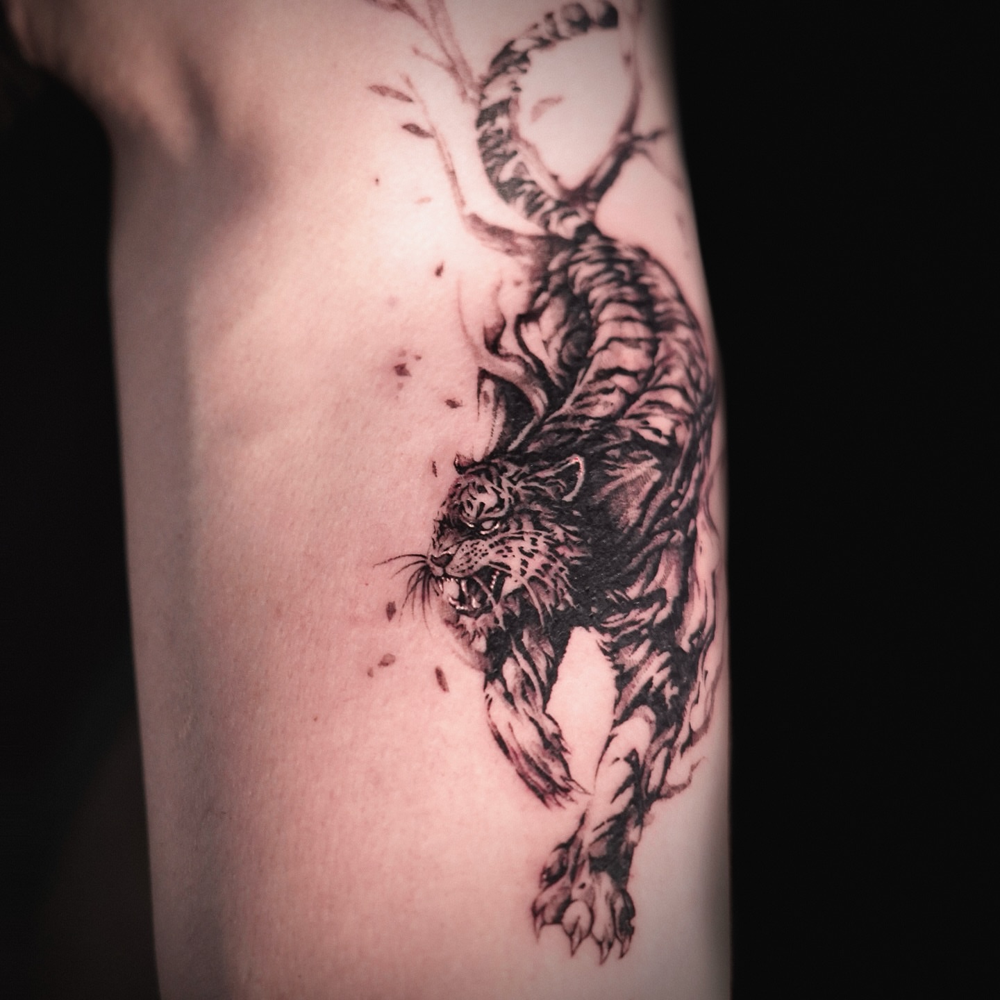 Tattoo by @dowoo_tattoo — black_and_grey, realism