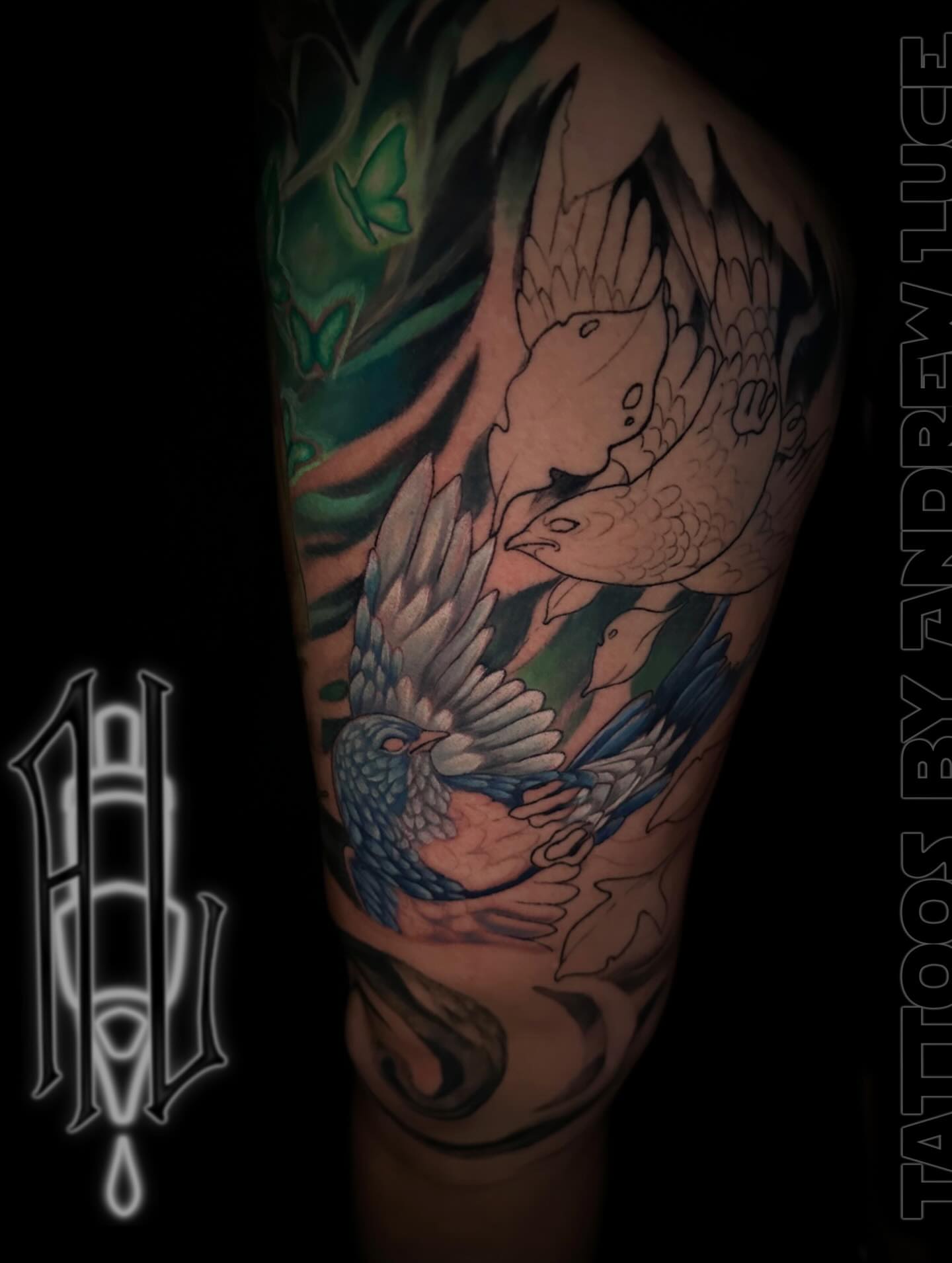 Koi fish and bird japanese irezumi tattoo on the forearm by Andrew Luce