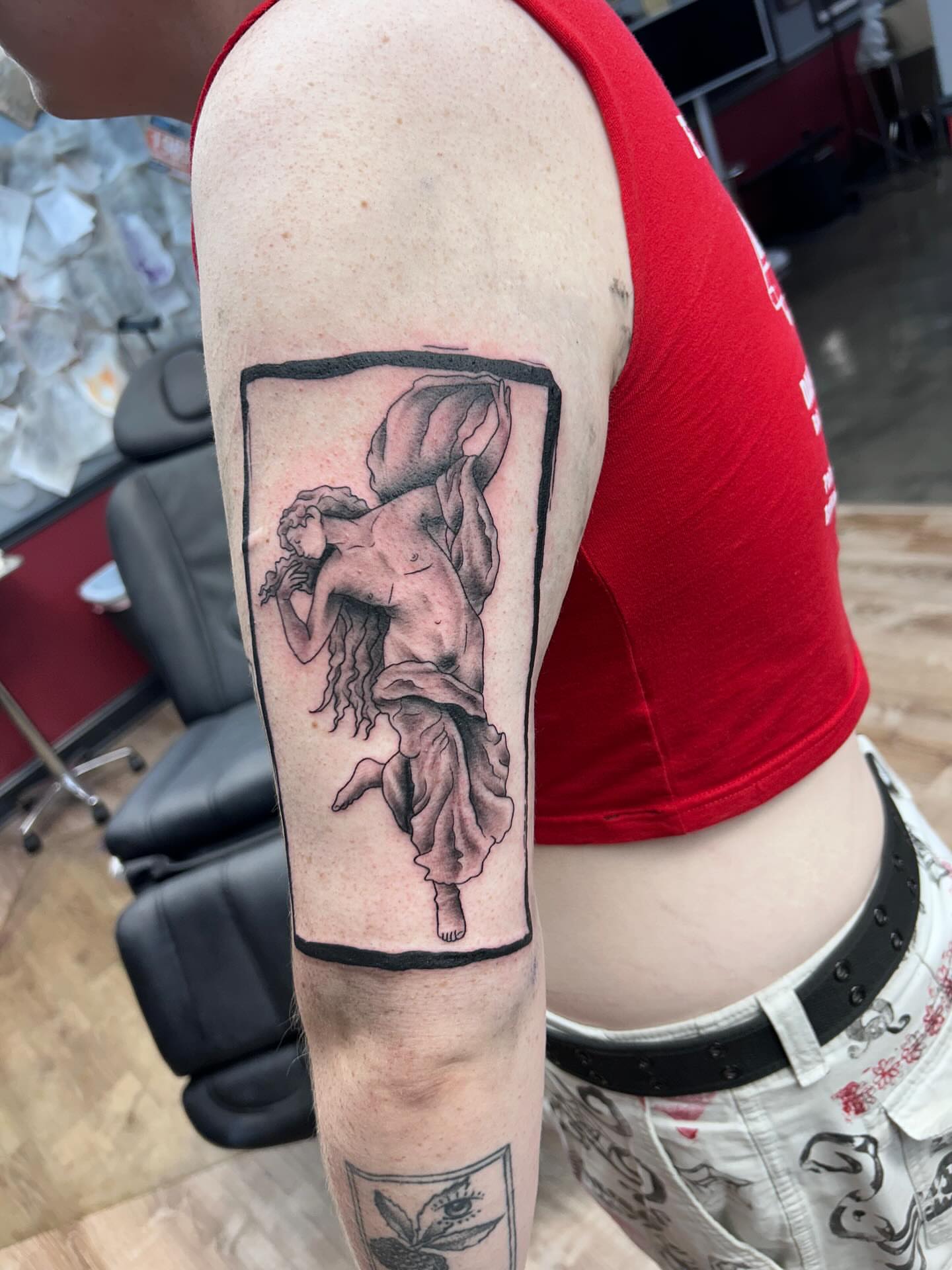 Statue of a woman black and grey tattoo on the forearm by Ricardo (RJ)