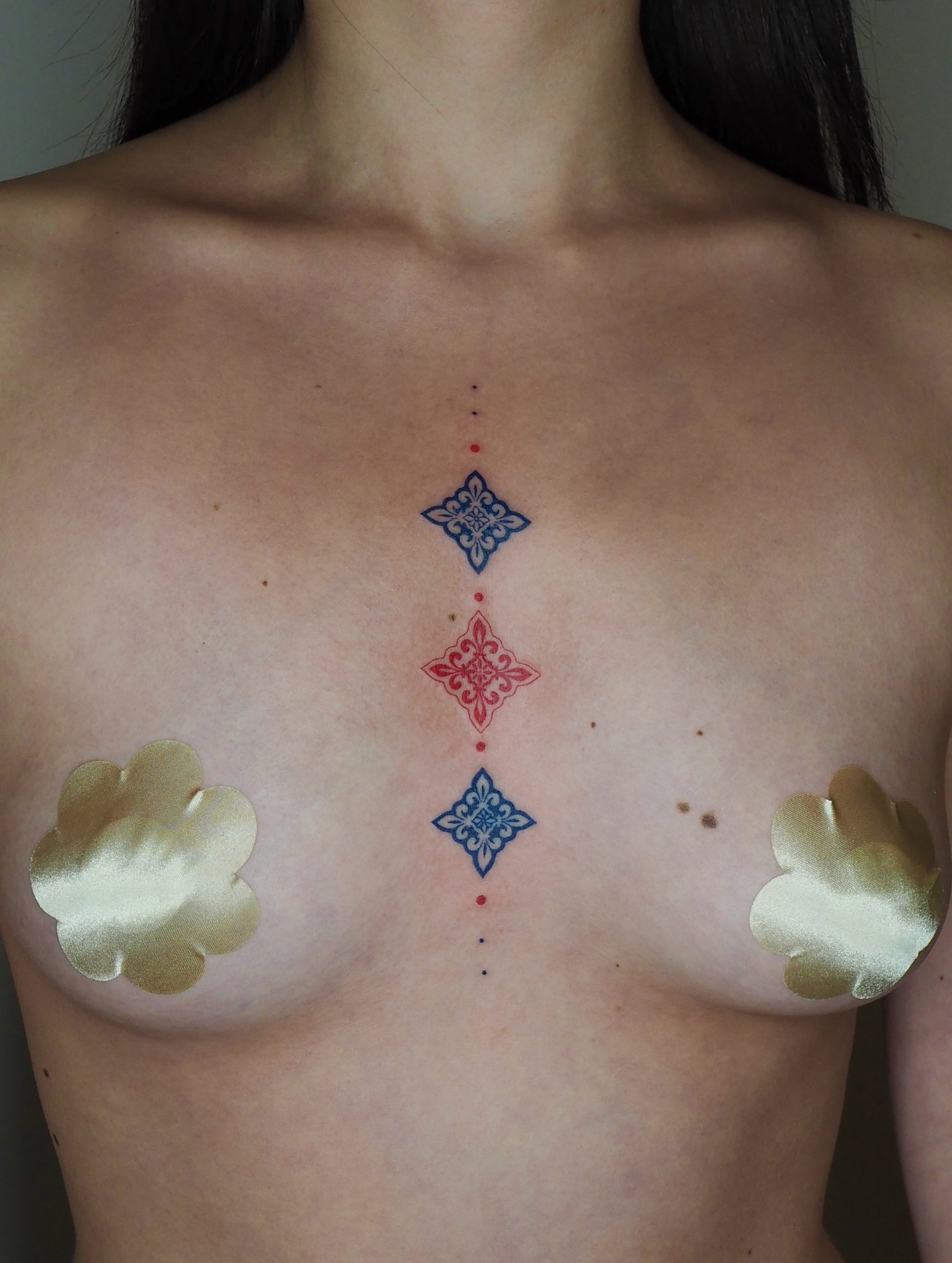 Crosses dotwork tattoo on the chest by A. Eye Tat
