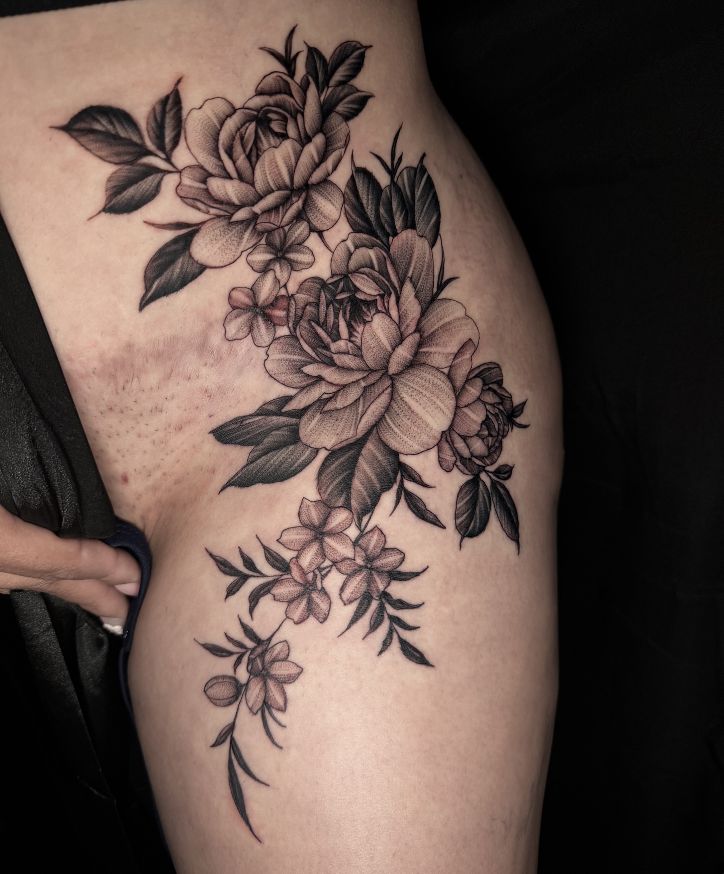 Peony bouquet black and grey tattoo on the thigh by Gabah🌹