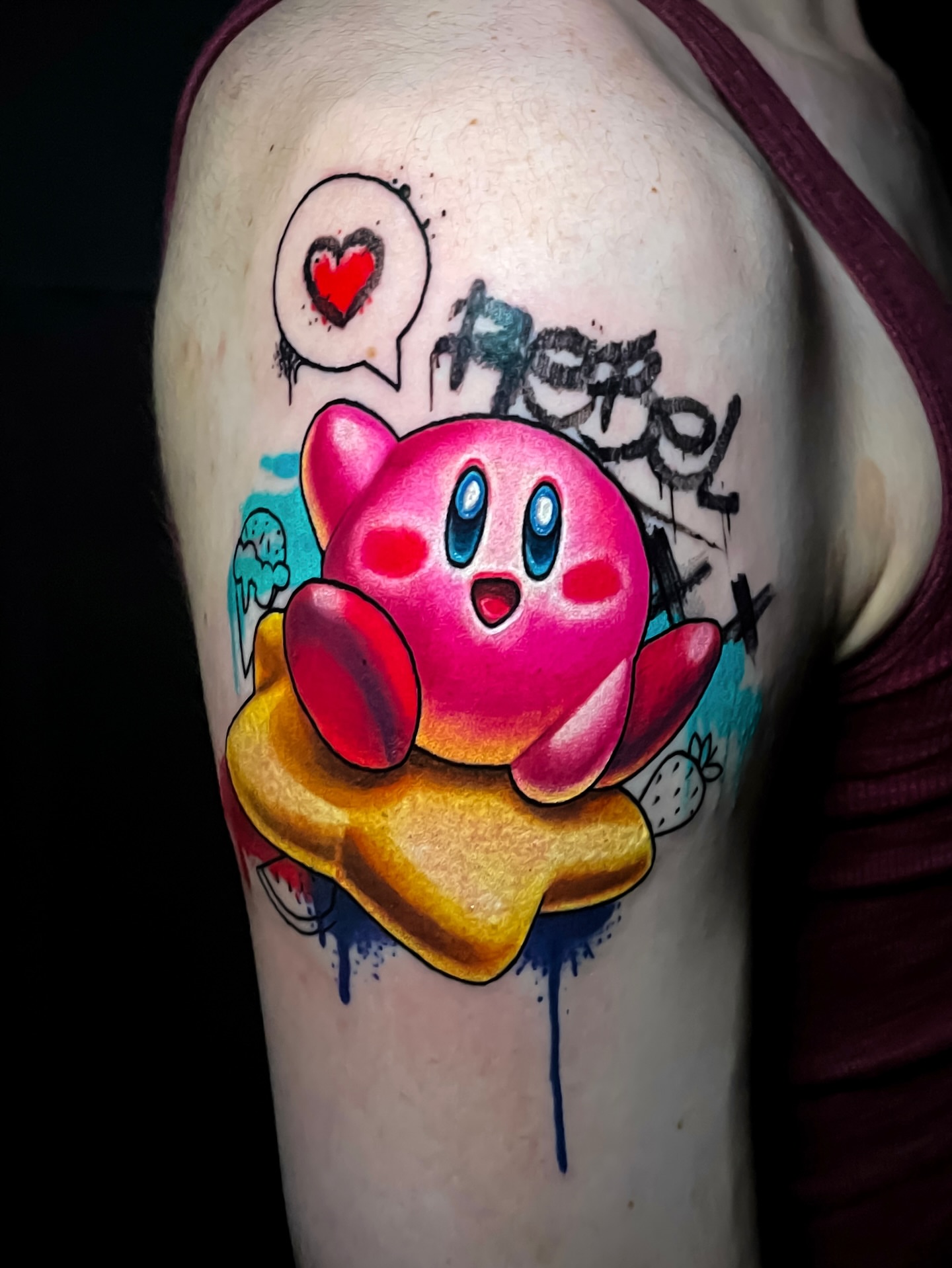Kirby anime tattoo on the shoulder by Tattoo artist in Seattle, WA
