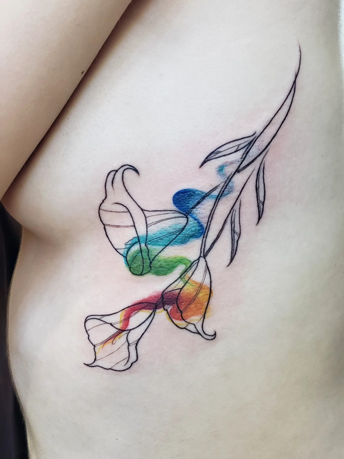 Tattoo by @oriotat2 — watercolor