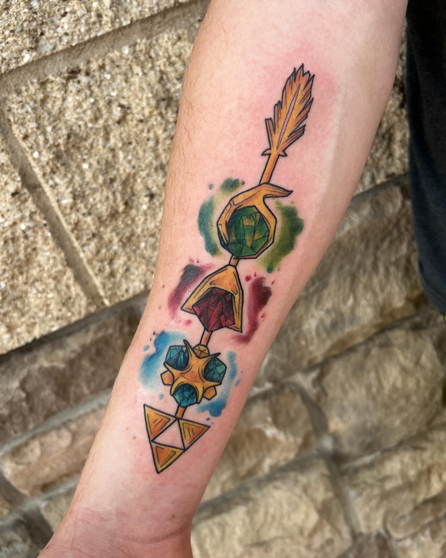 Arrow and gemstones geometric tattoo on the forearm by Taya Lynn, Hudson, Wisconsin