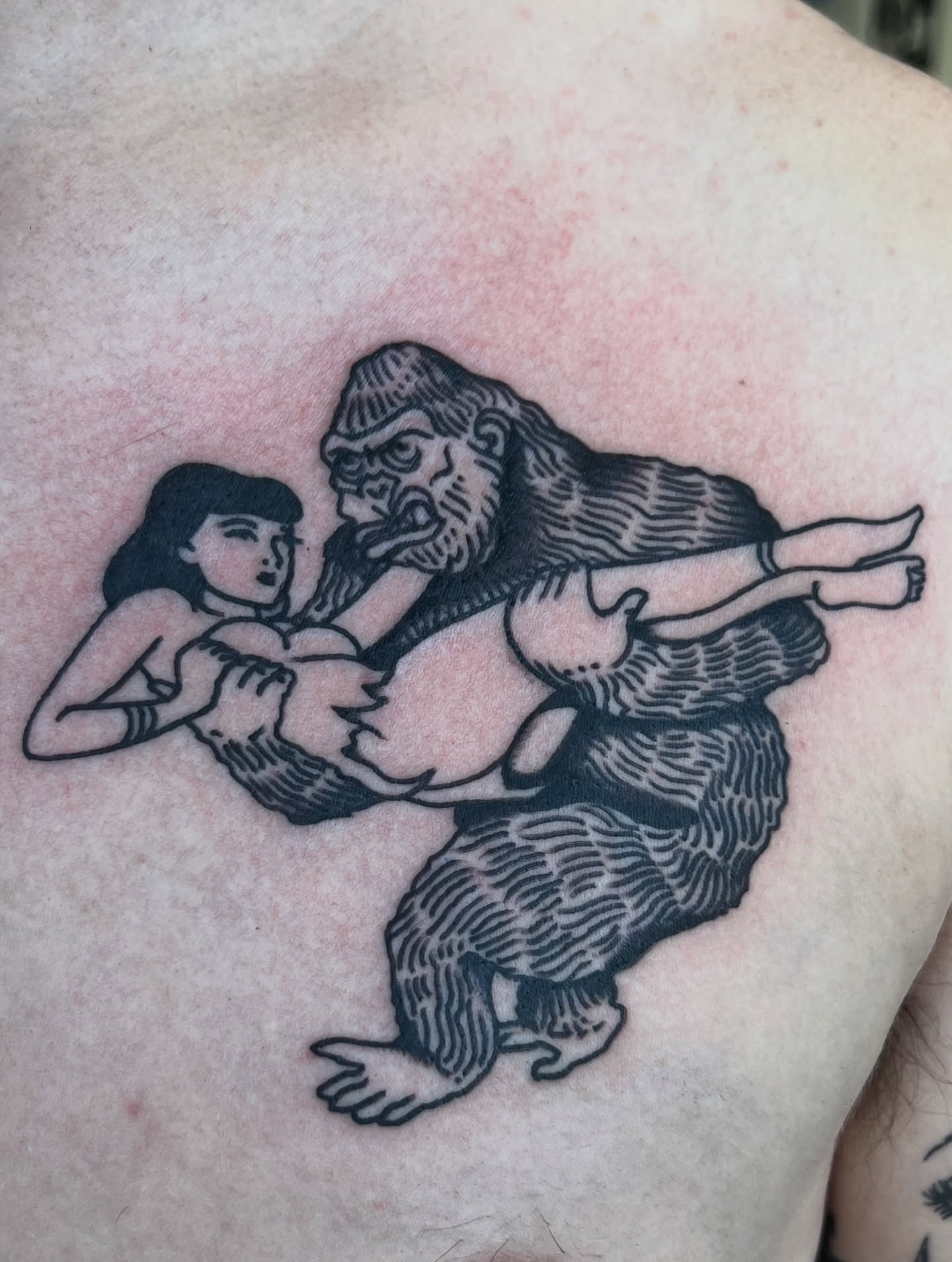 Gorilla and woman black and grey tattoo on the chest by @syrenbier, San Francisco, California