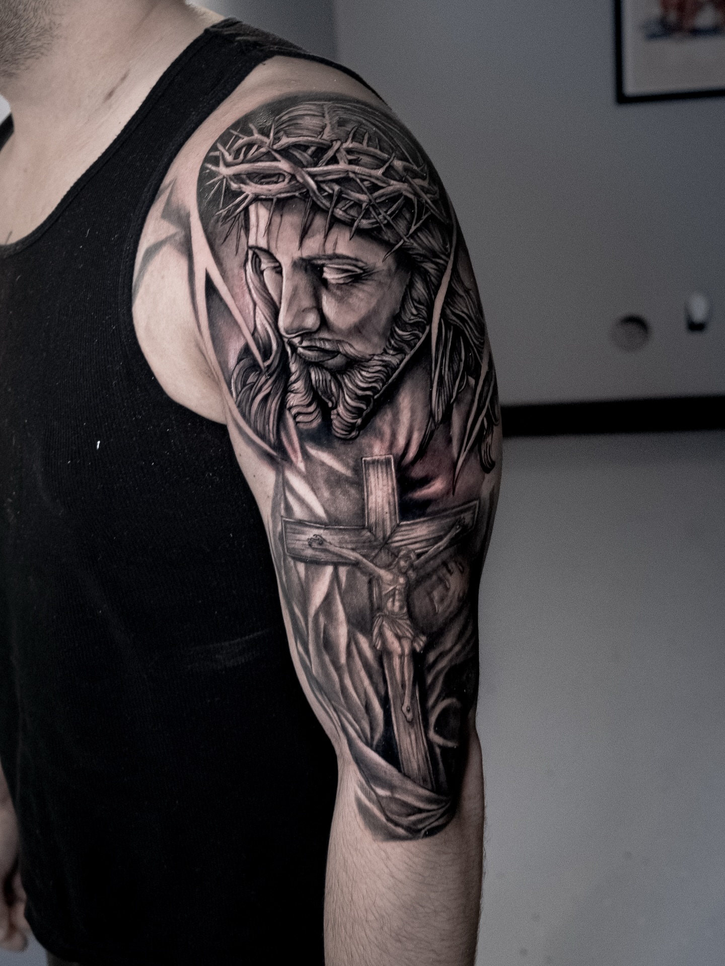 Tattoo by @eriktats13 — realism, black_and_grey
