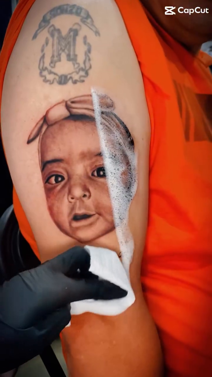 Tattoo by @ruach_ink — realism, black_and_grey