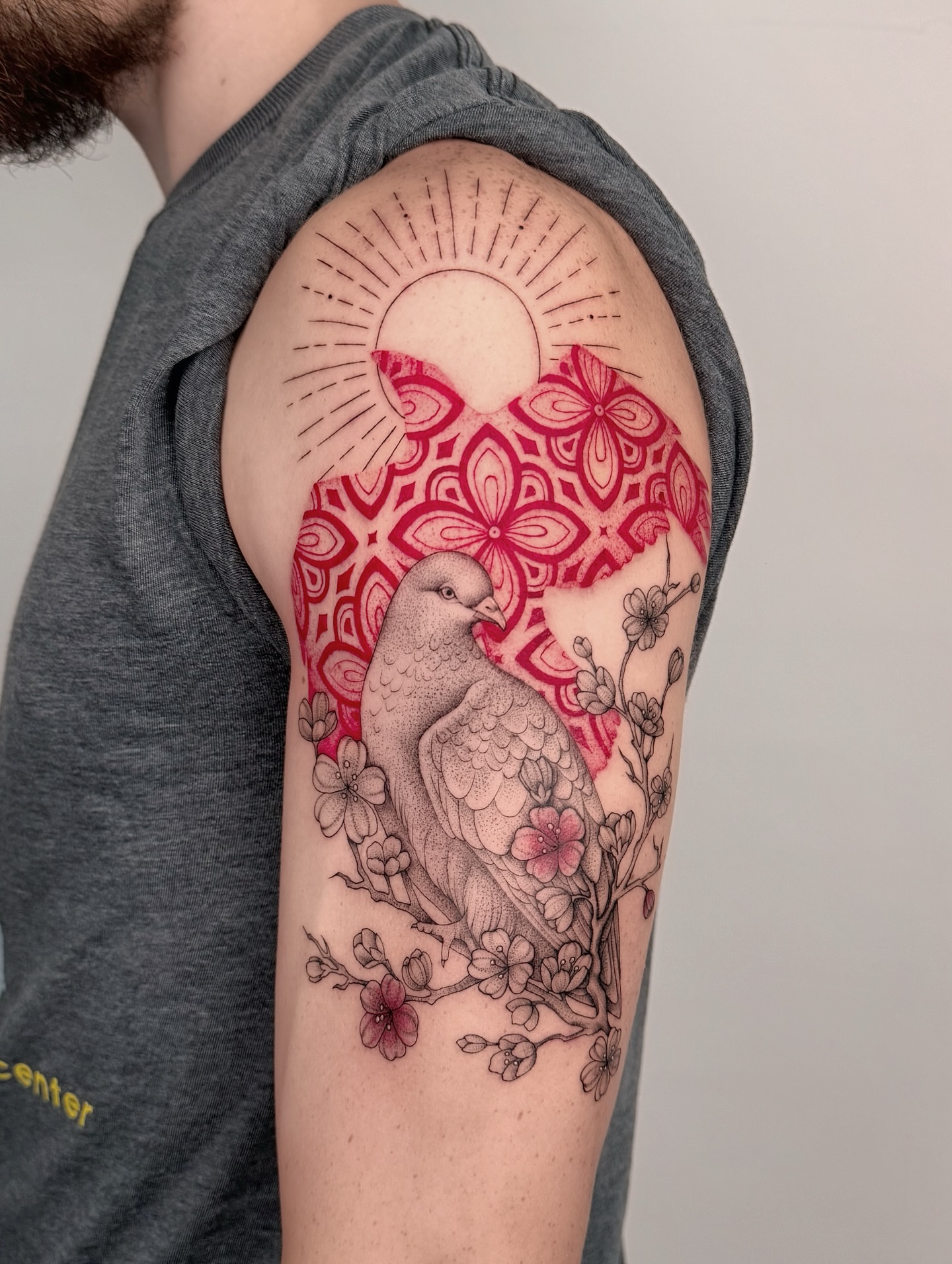 Bird and floral mandala neo-traditional tattoo on the upper arm by MillaKas ° Tattoos