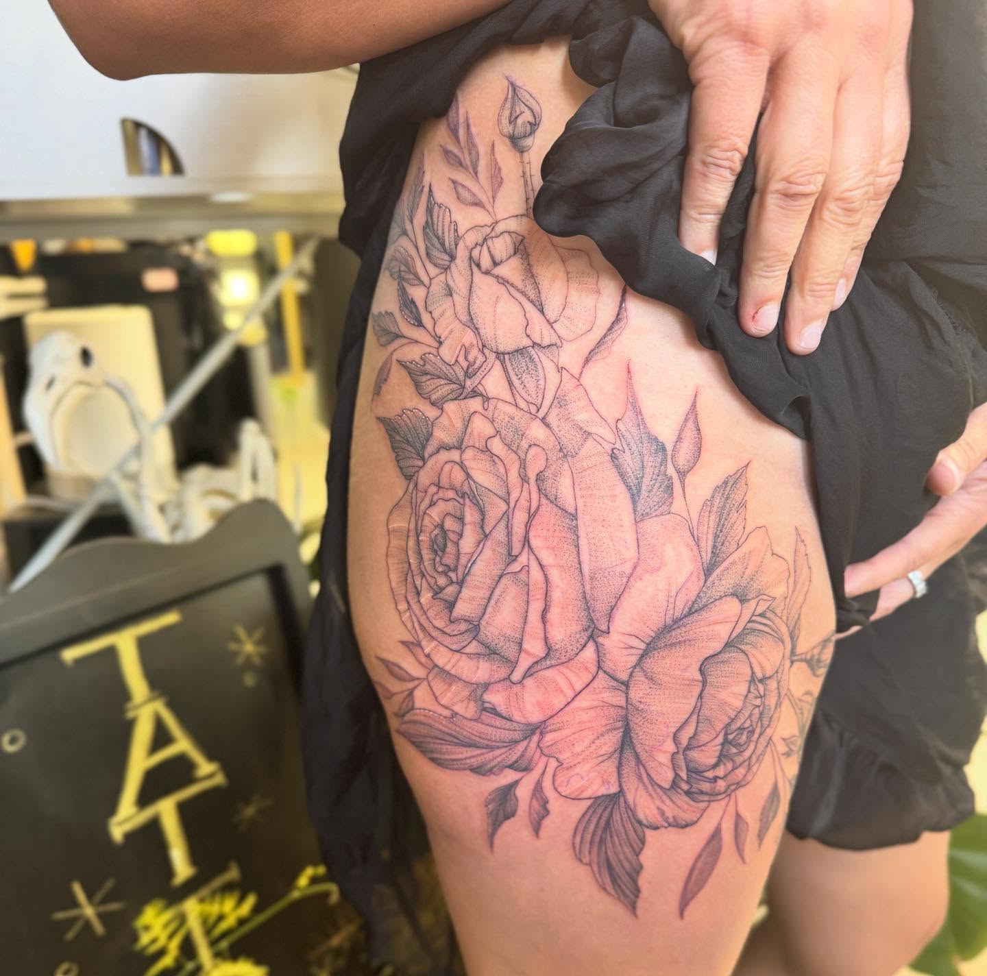 Roses dotwork tattoo on the thigh by Aura Noire