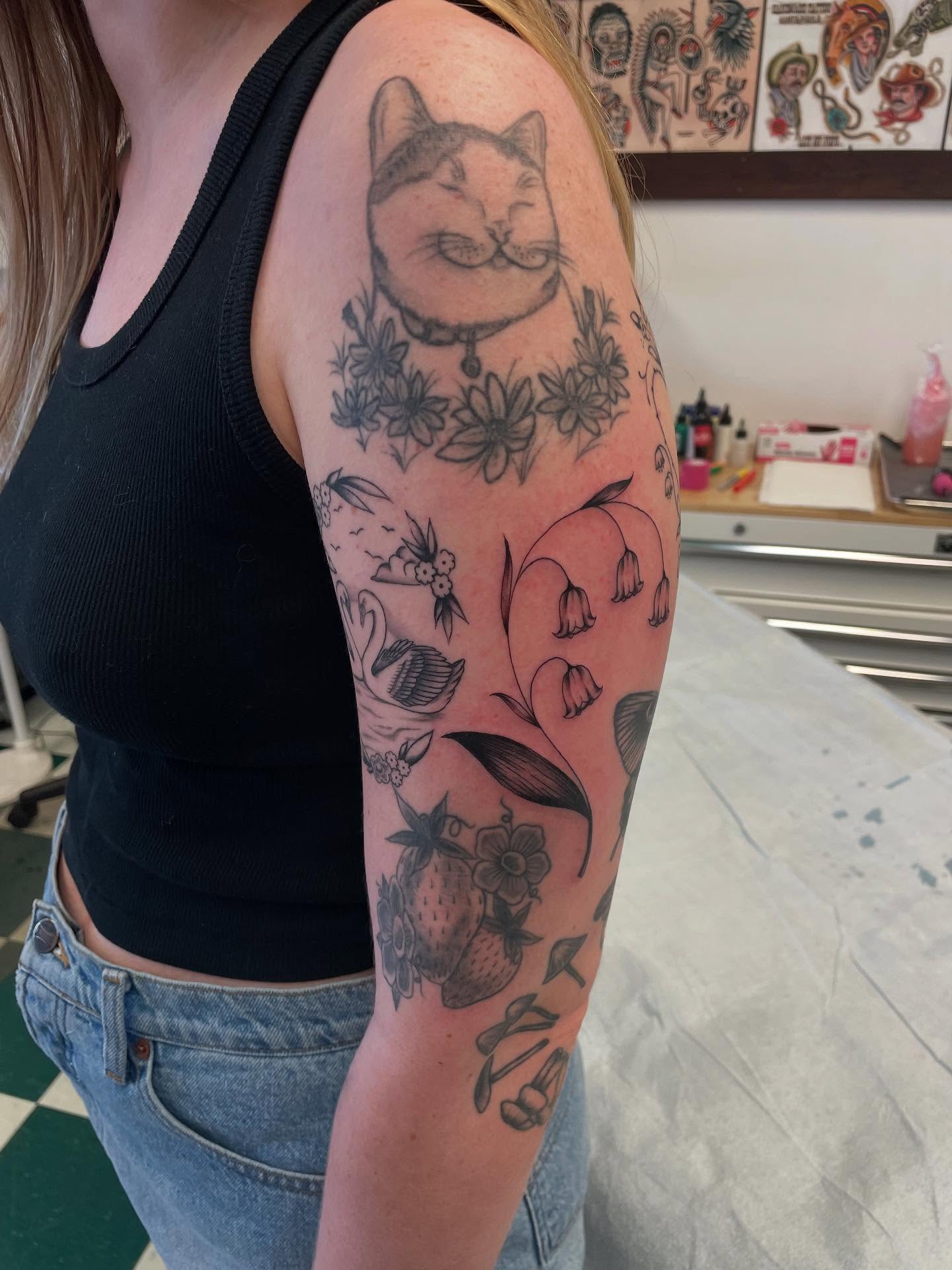 Cat and floral black and grey tattoo on the forearm by Dayton Tattoo Artist, Miamisburg, Ohio