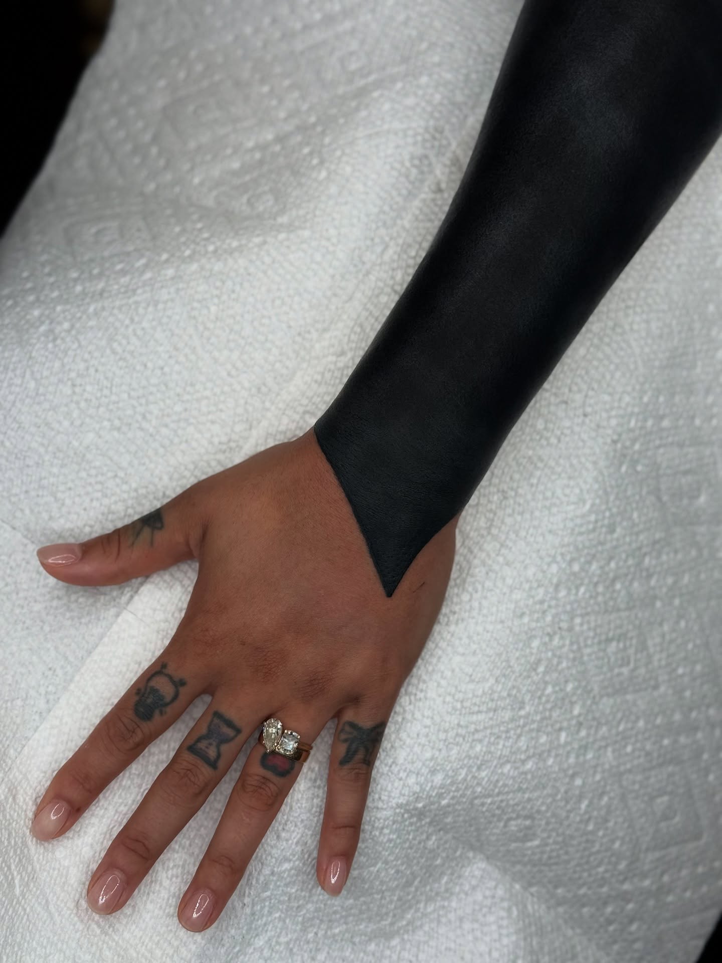Tattooed hand black and grey tattoo on the hand by T Dubs ✏️