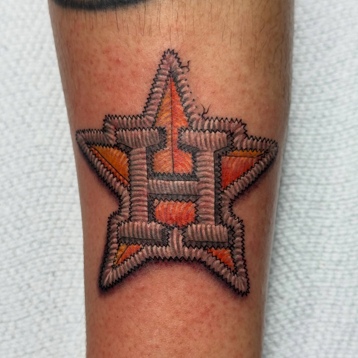 Star geometric tattoo on the forearm by Lacee-Beth Finch