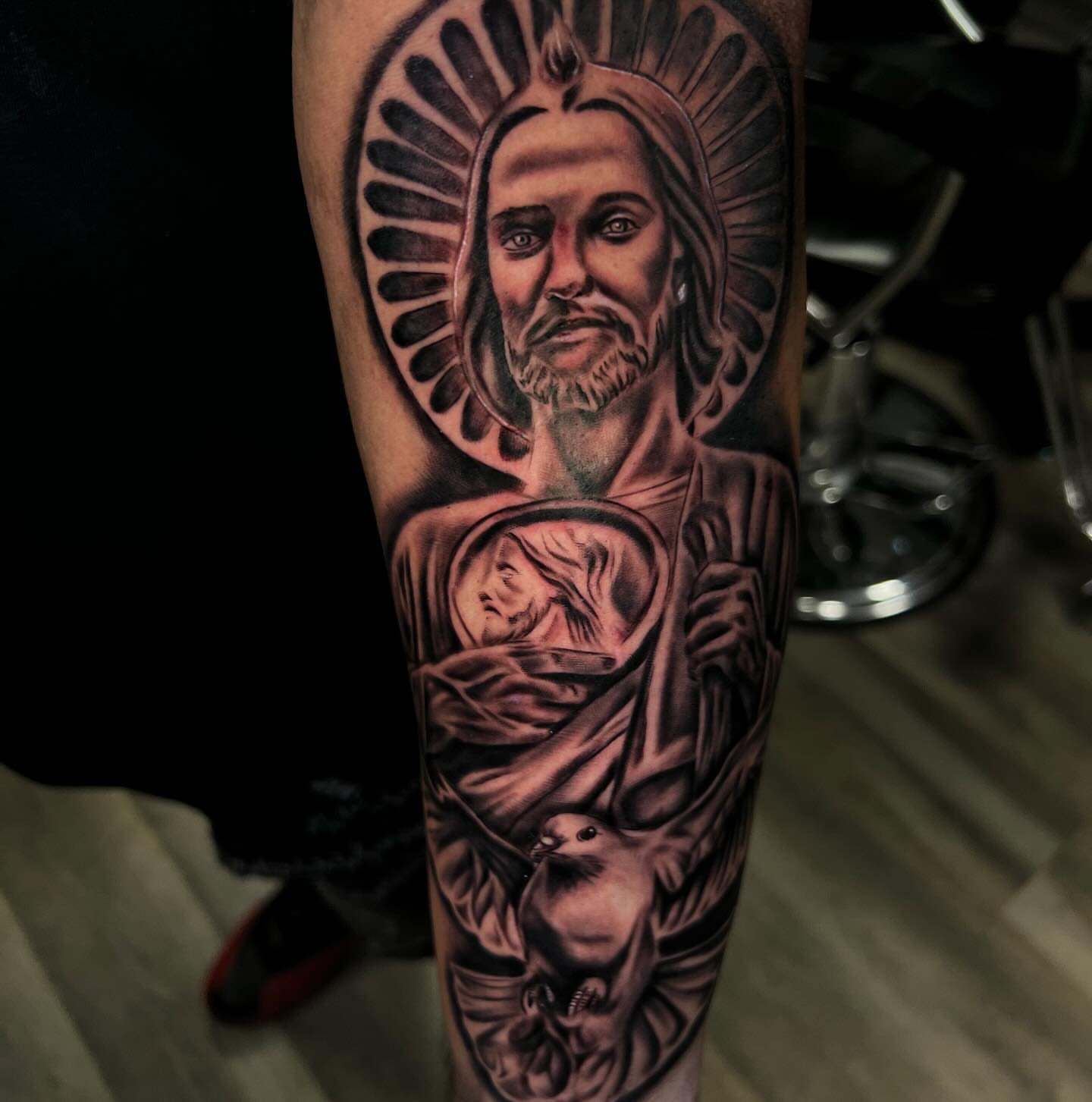 Religious figure realism tattoo on the forearm by Kevyn Vidal