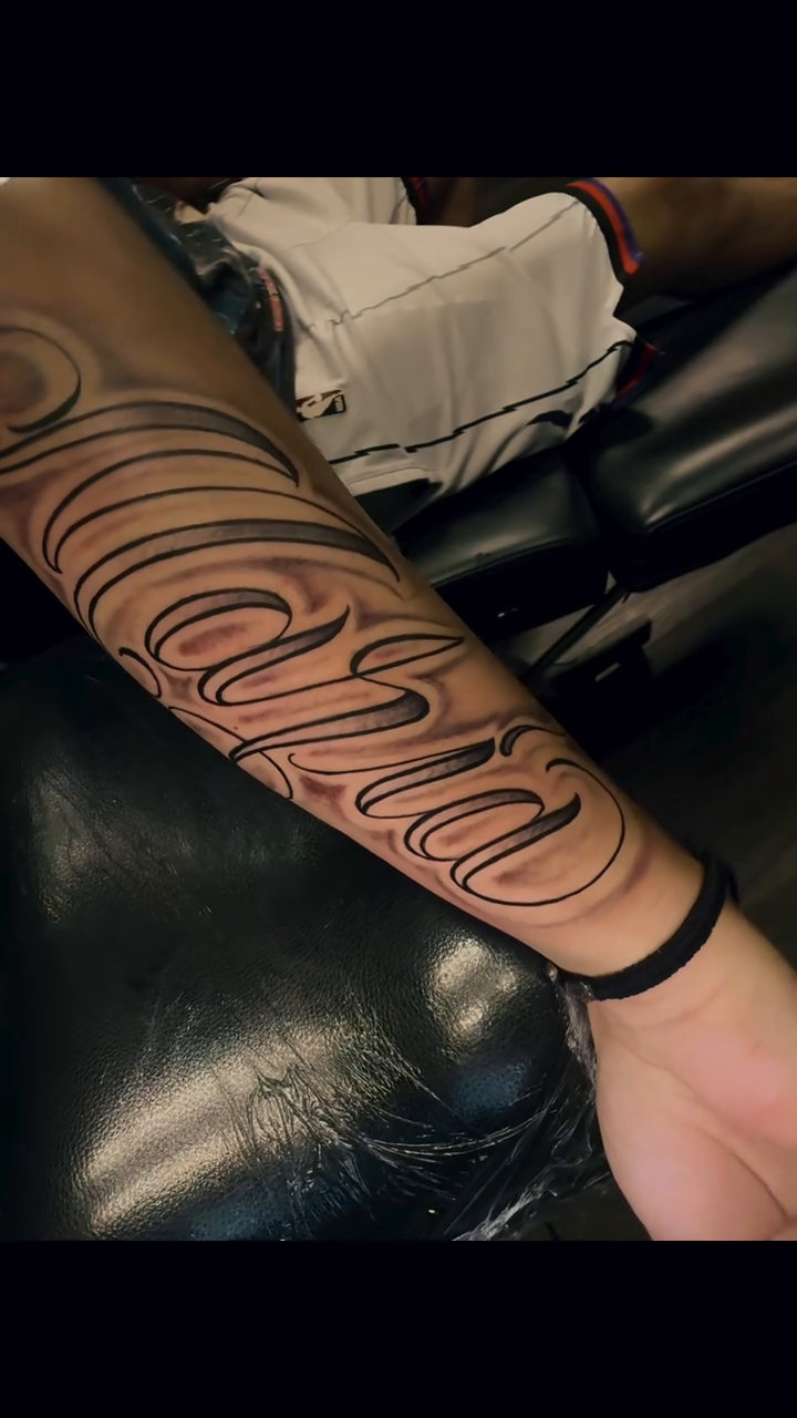 Tattoo by @chicago_inkslinger — lettering_script