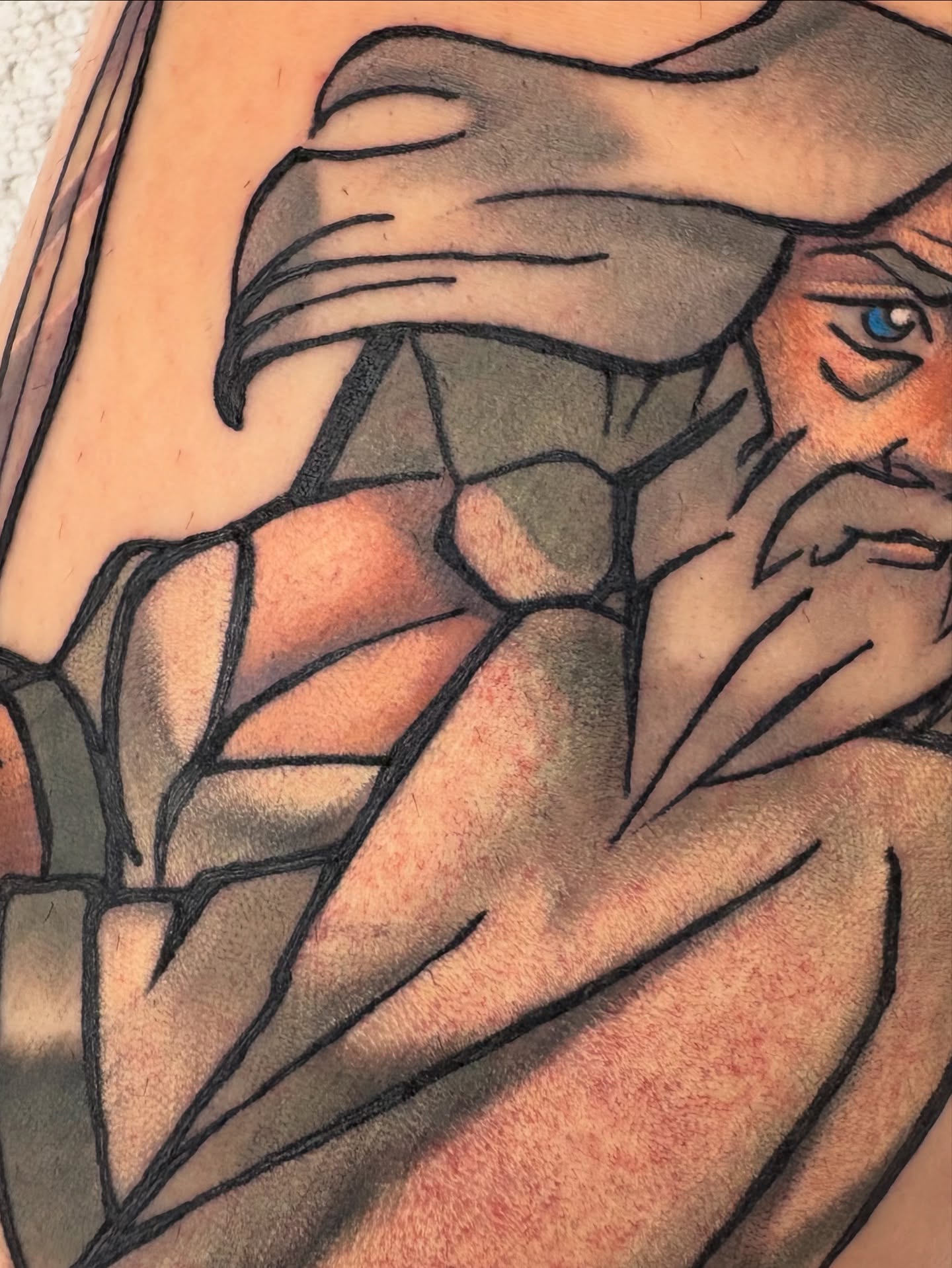 Man with mask geometric tattoo on the forearm by Gabby