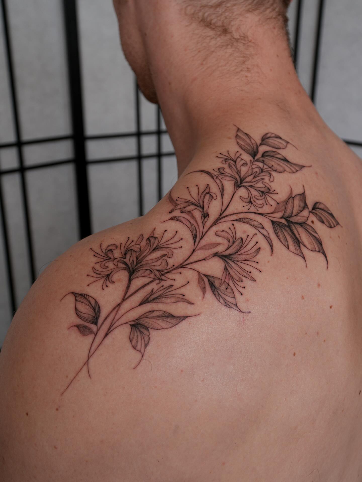 Flower bouquet black and grey tattoo on the shoulder by Pandora ✨ Floral, Los Angeles, California