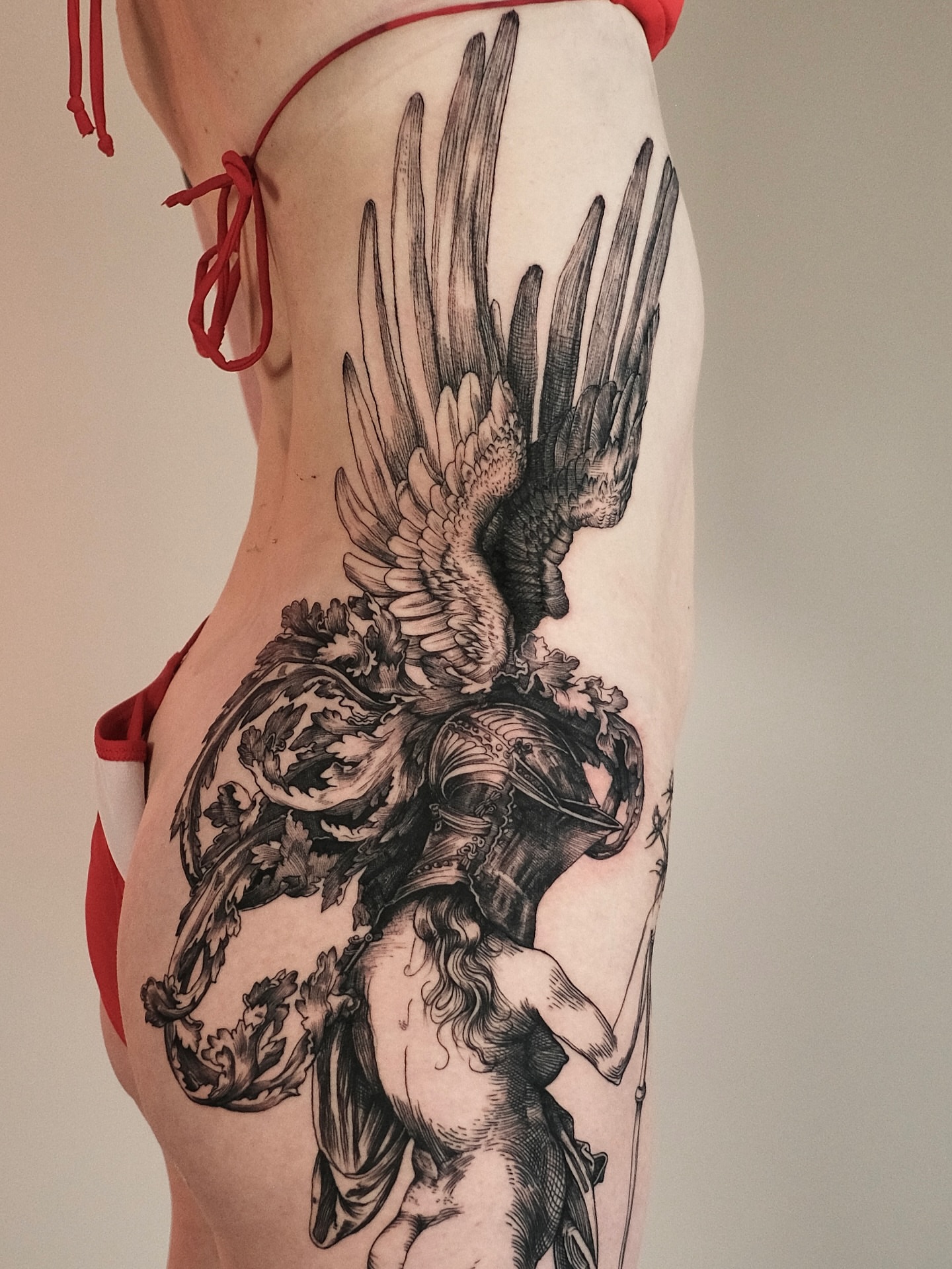 Angel with dragon realism tattoo on the thigh by Zanereti