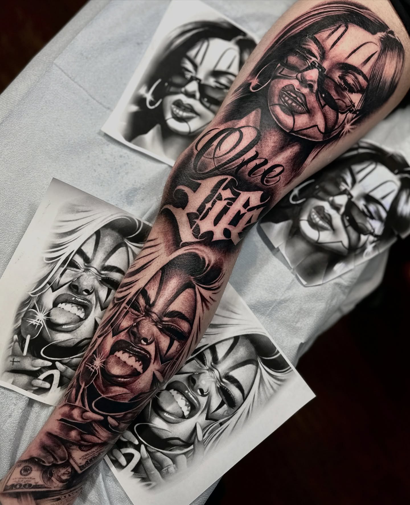 Female faces realism tattoo on the forearm by Ray Ochoa