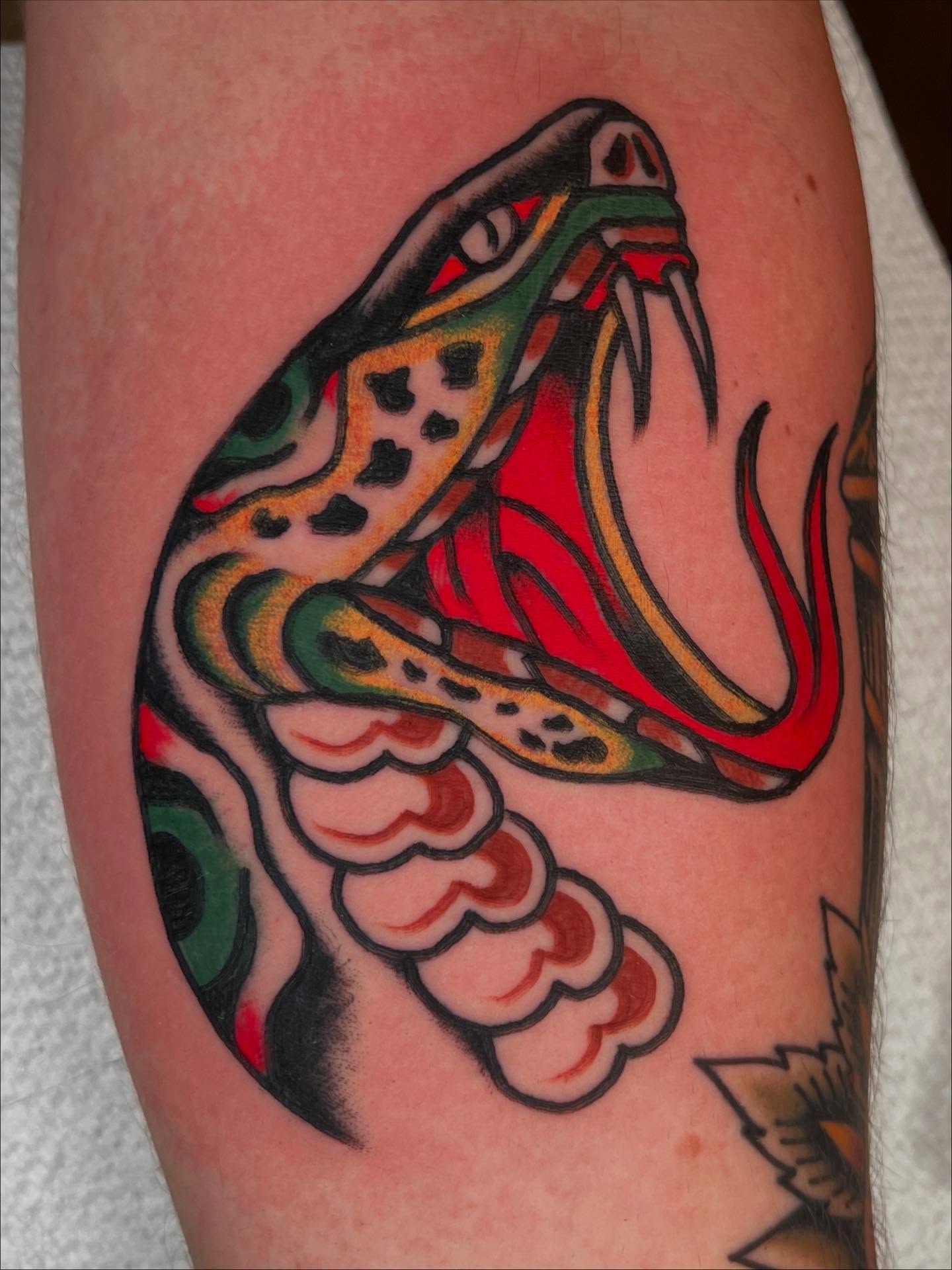 Snake American traditional tattoo on the forearm by 💥Jeff Klug💥, Austin, Texas