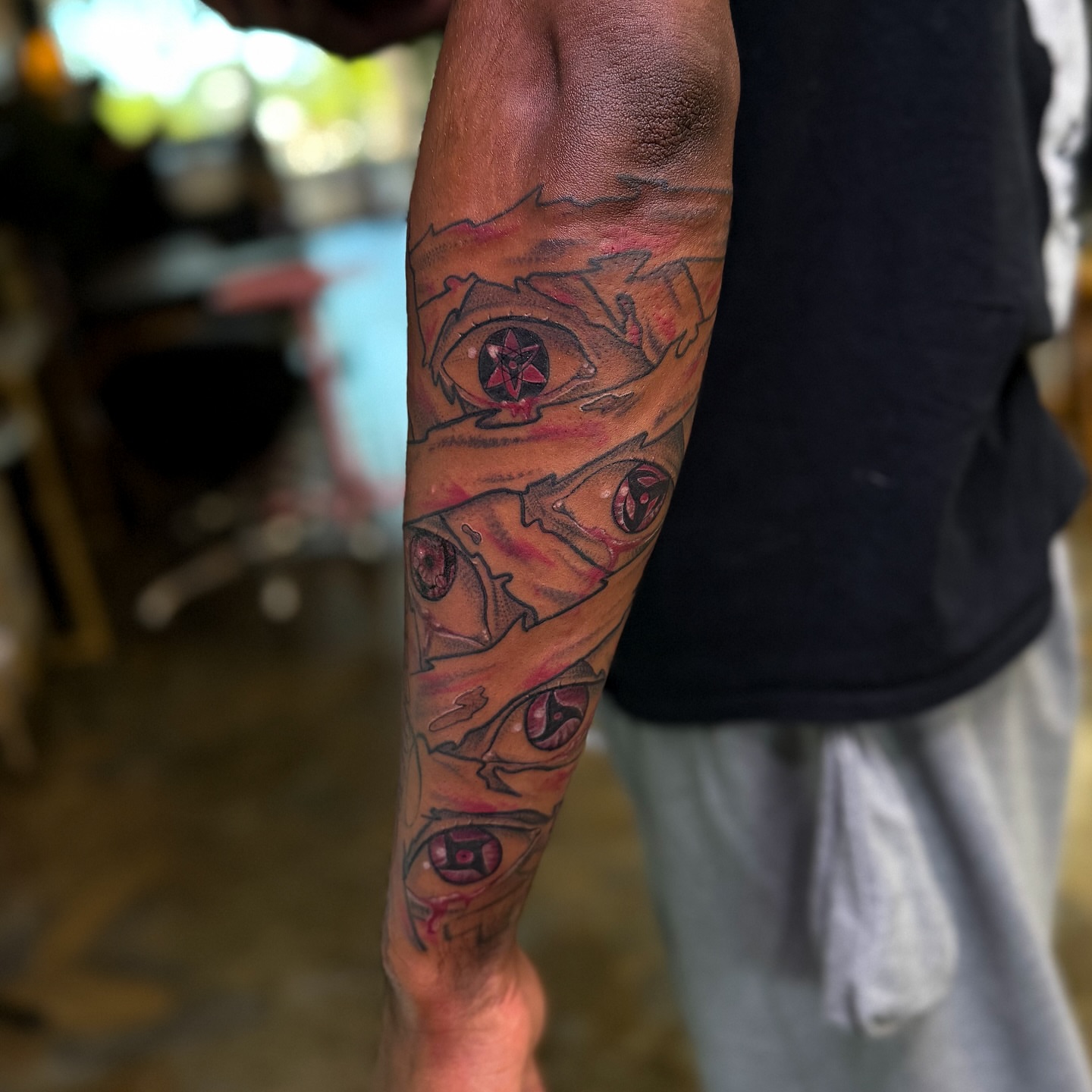 Eyes neo-traditional tattoo on the forearm by Yohana Vargas
