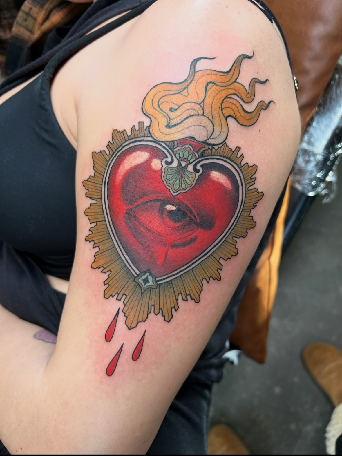 Heart with eye American traditional tattoo on the shoulder by Amanda Leitch