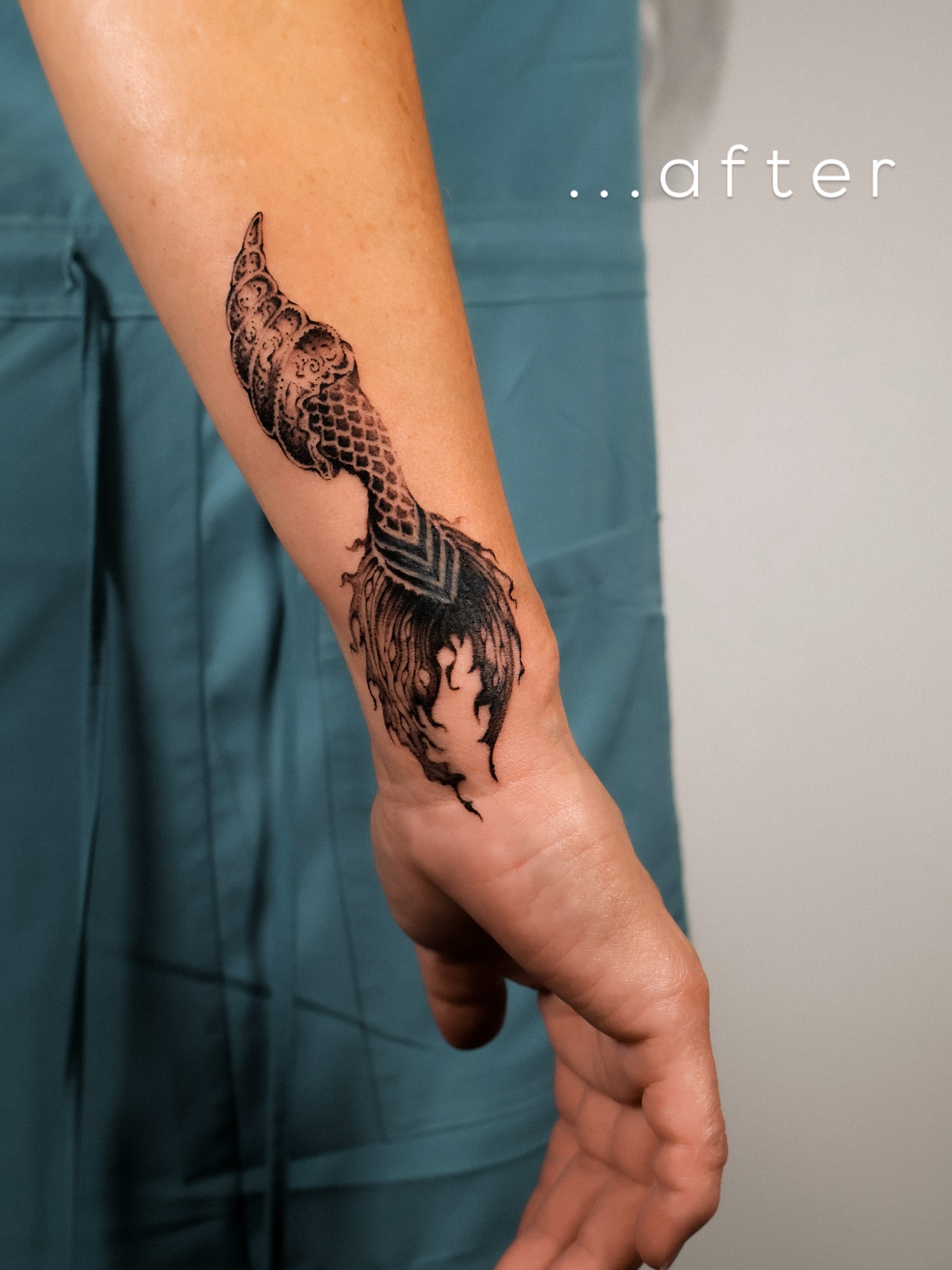Serpent black and grey tattoo on the forearm by Grace Zarmina Hessam