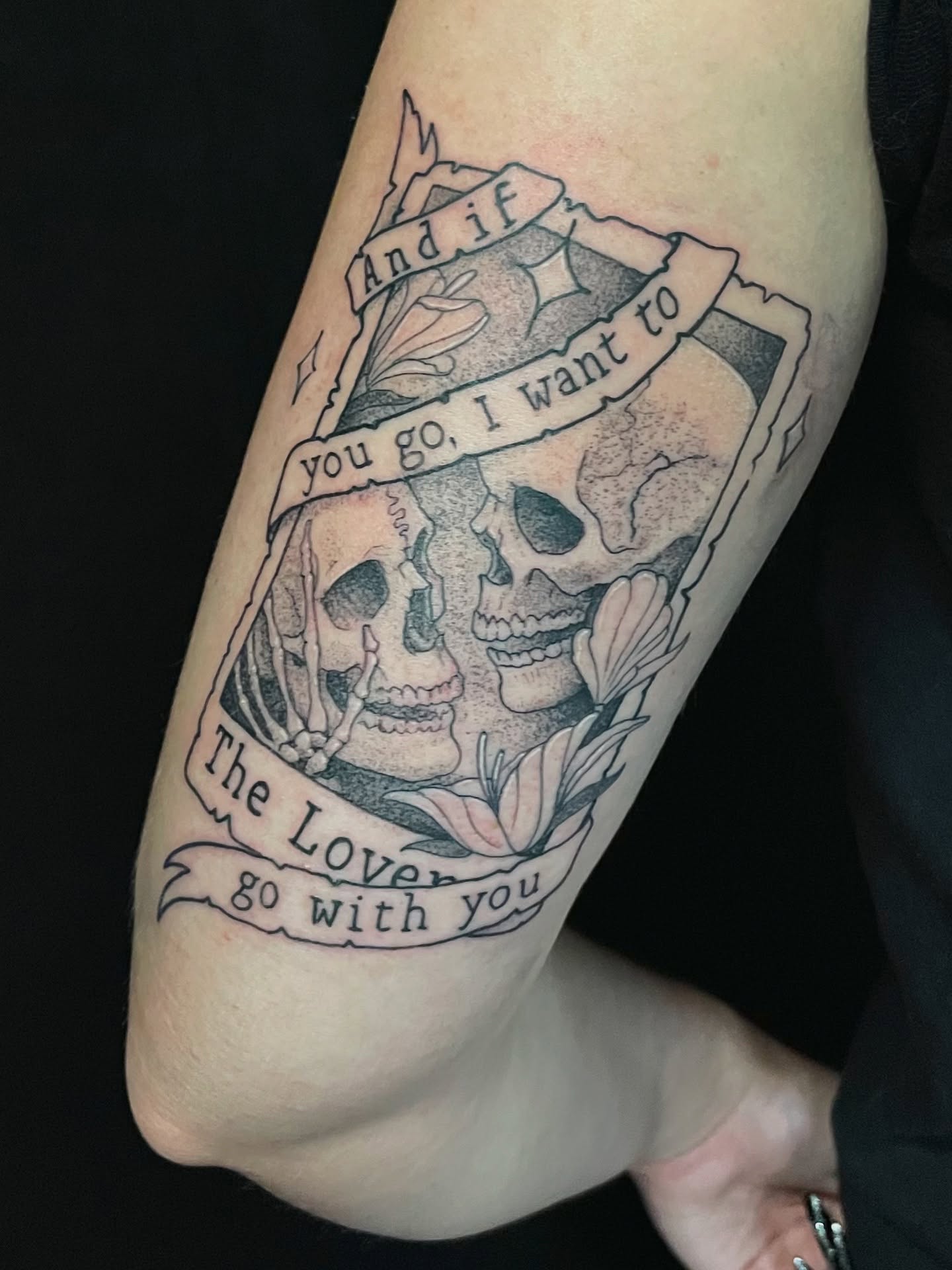 Skulls and flowers black and grey tattoo on the forearm by Will McCoy (Tattooist), Murray, Utah