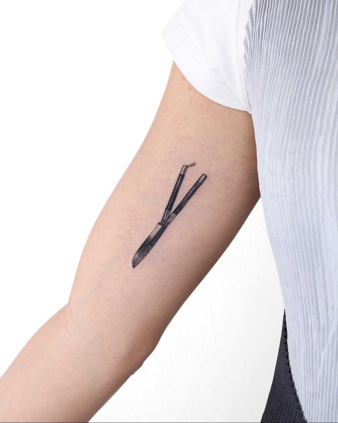 Tattoo by @tatmostat — realism, black_and_grey