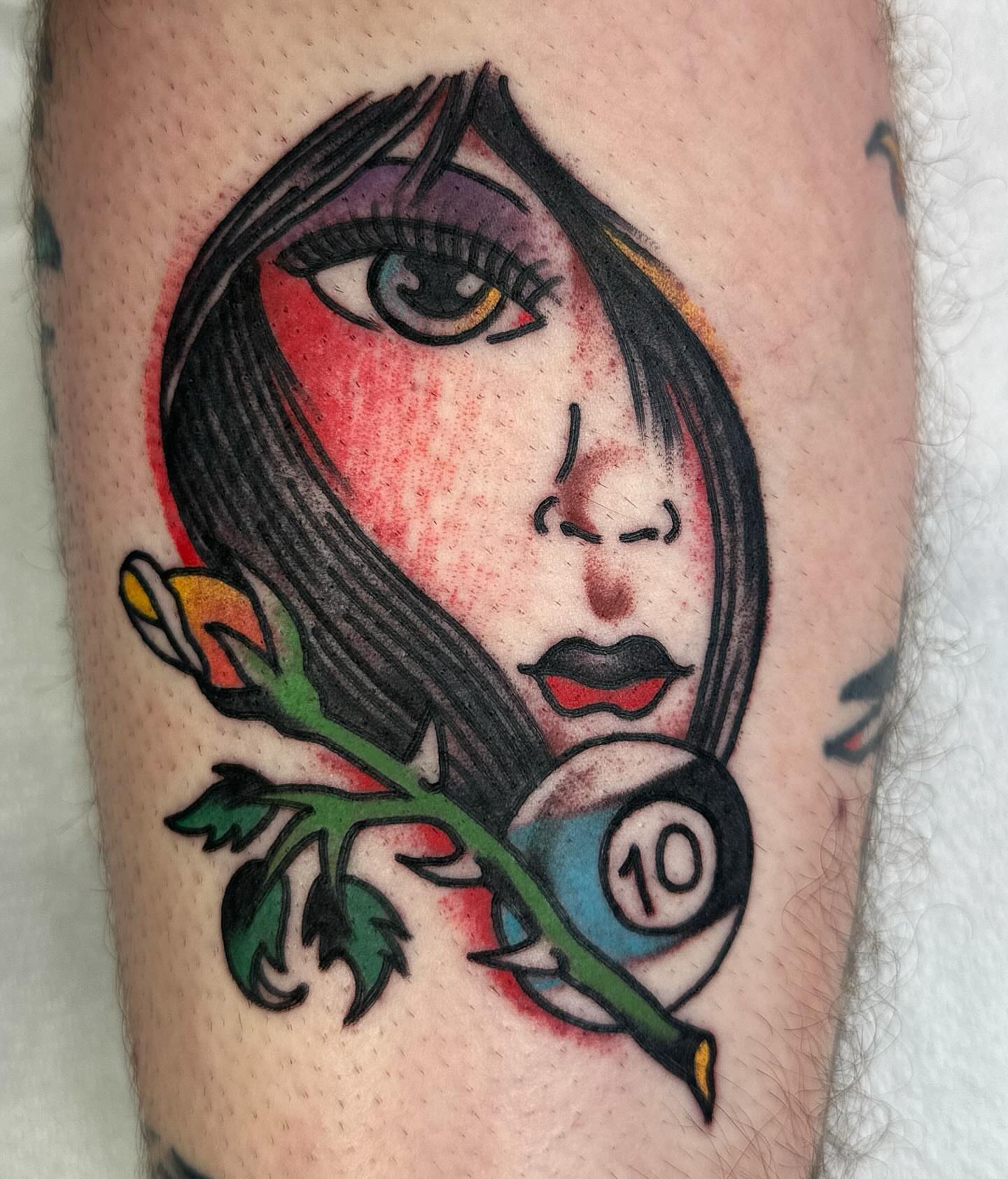 Woman with billiard ball American traditional tattoo on the forearm by David Devaney, Knoxville, Tennessee