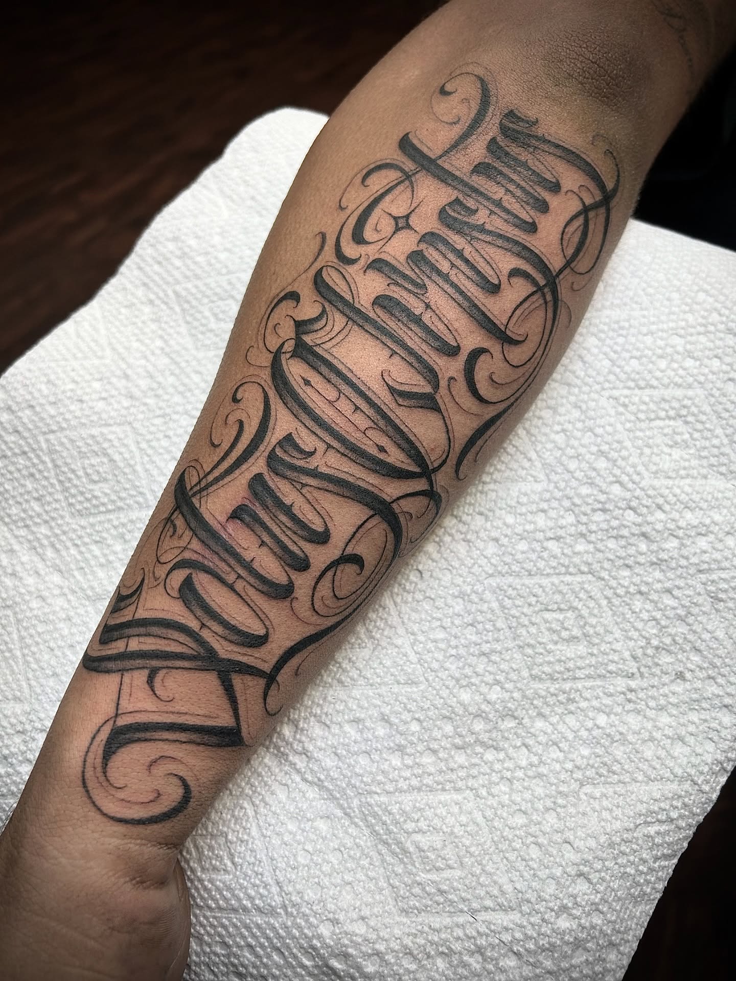 Script lettering lettering script tattoo on the forearm by $krypt