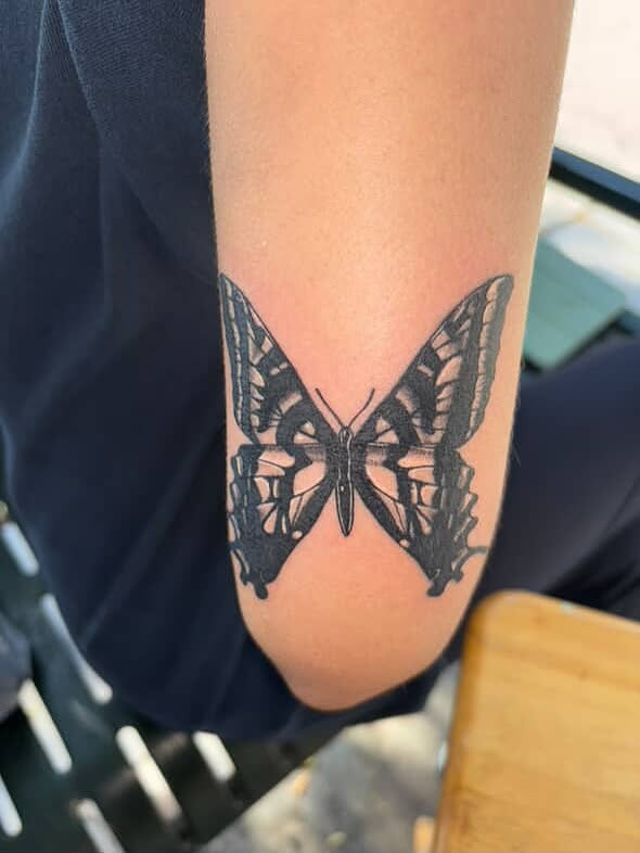 Butterfly black and grey tattoo on the forearm by zion