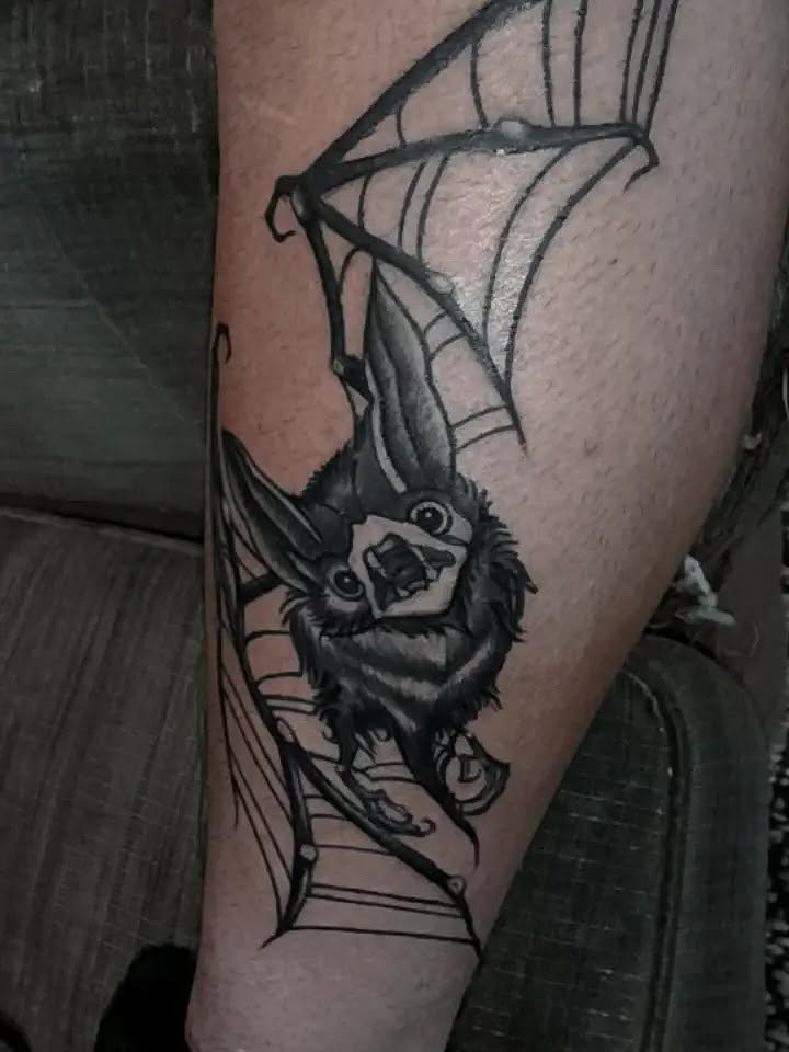 Bat black and grey tattoo on the forearm by zion