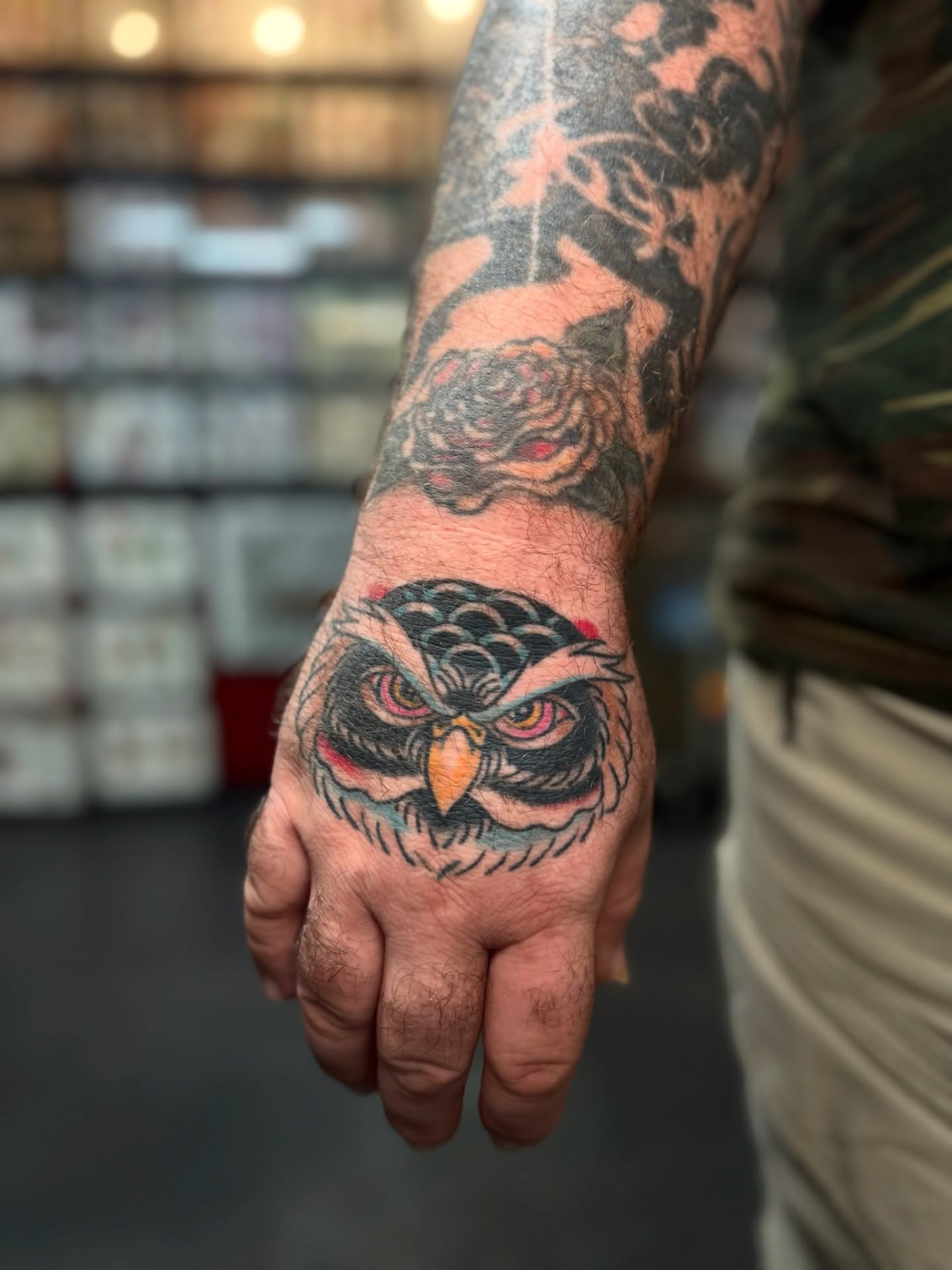 Owl American traditional tattoo on the hand by Bre