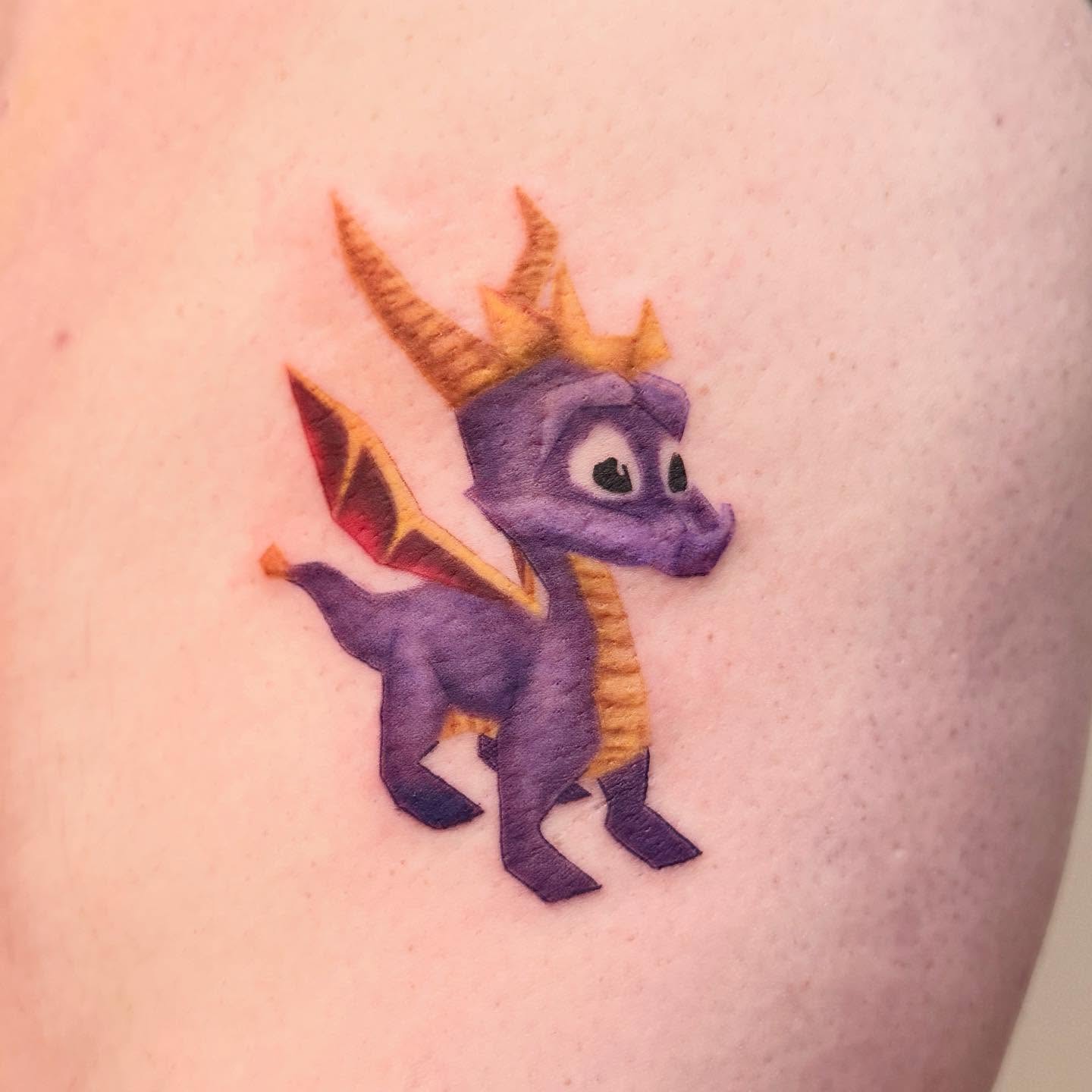 Spyro the Dragon new school tattoo on the shoulder by Kirsten