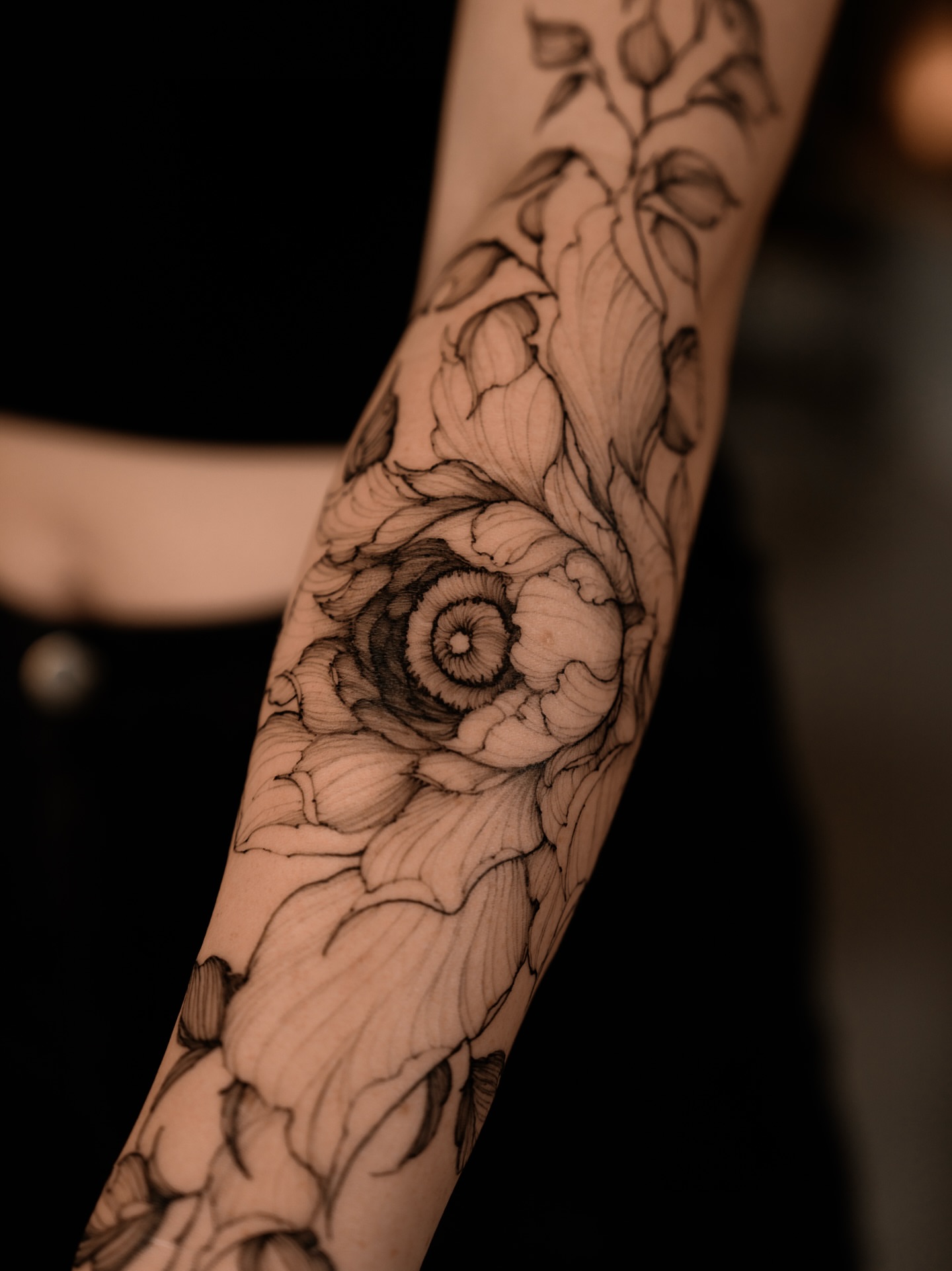 Flower black and grey tattoo on the forearm by Marek